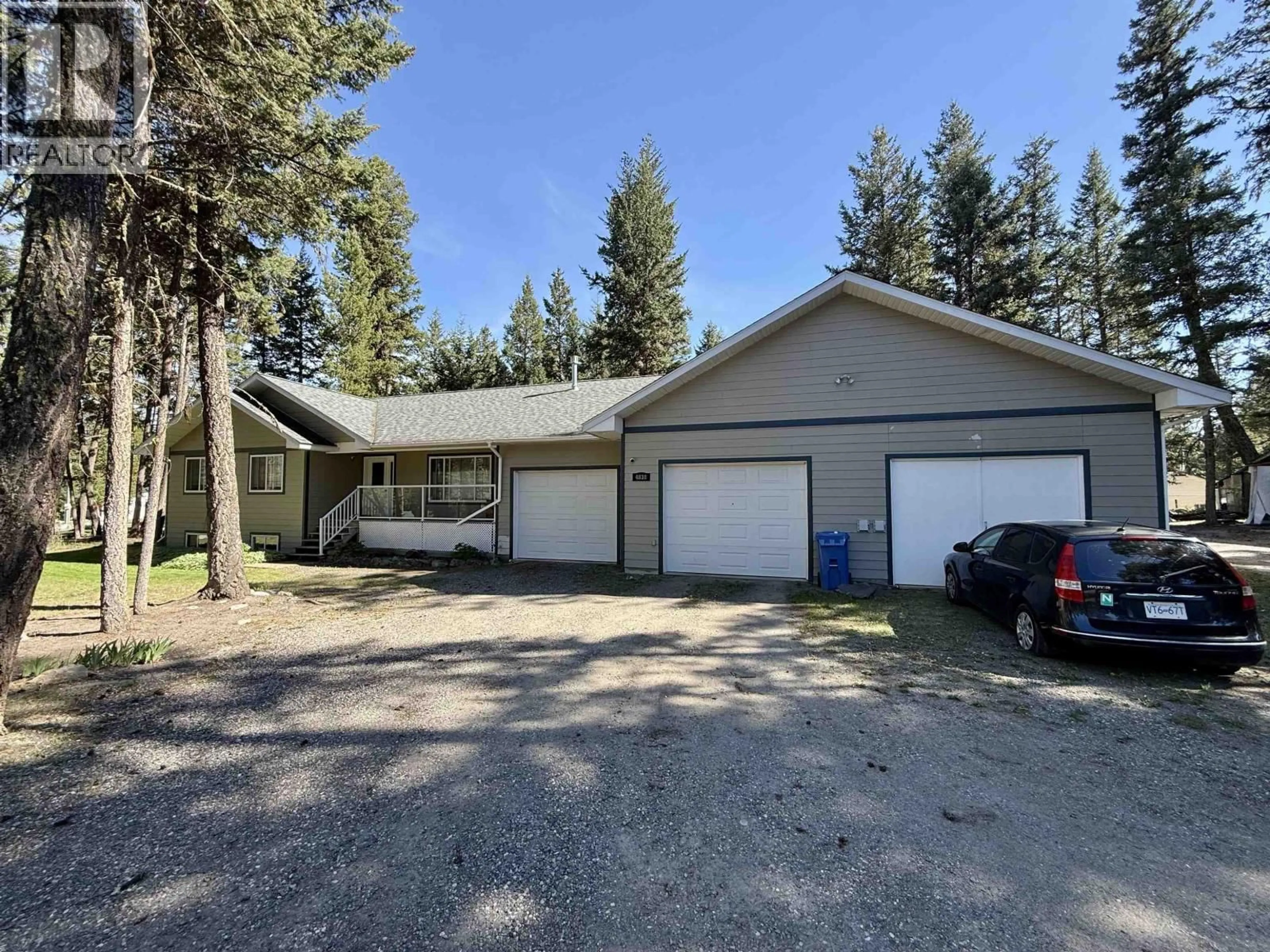 A pic from outside/outdoor area/front of a property/back of a property/a pic from drone, street for 4838 KITWANGA DRIVE, 108 Mile Ranch British Columbia V0K2Z0