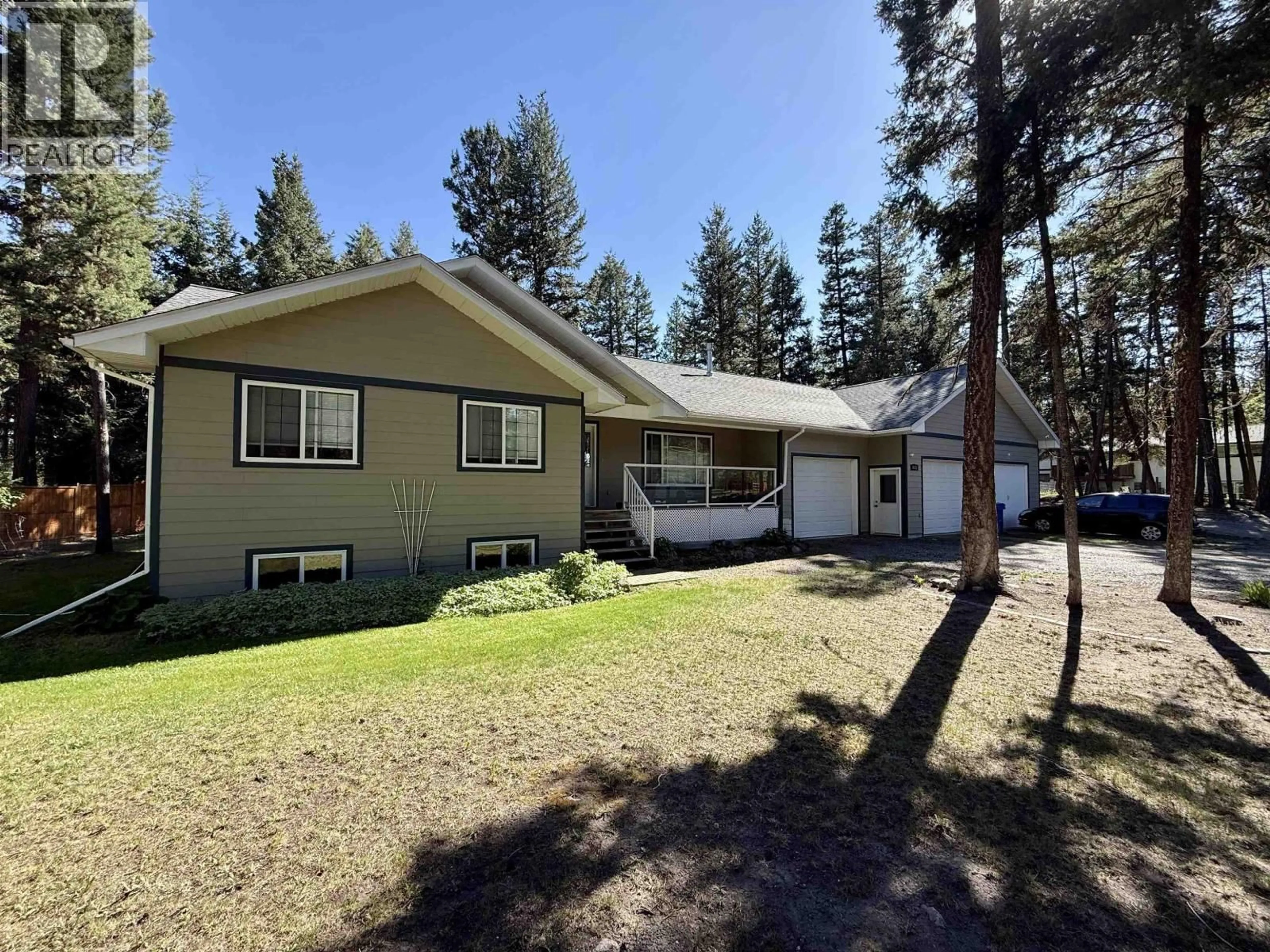 A pic from outside/outdoor area/front of a property/back of a property/a pic from drone, unknown for 4838 KITWANGA DRIVE, 108 Mile Ranch British Columbia V0K2Z0