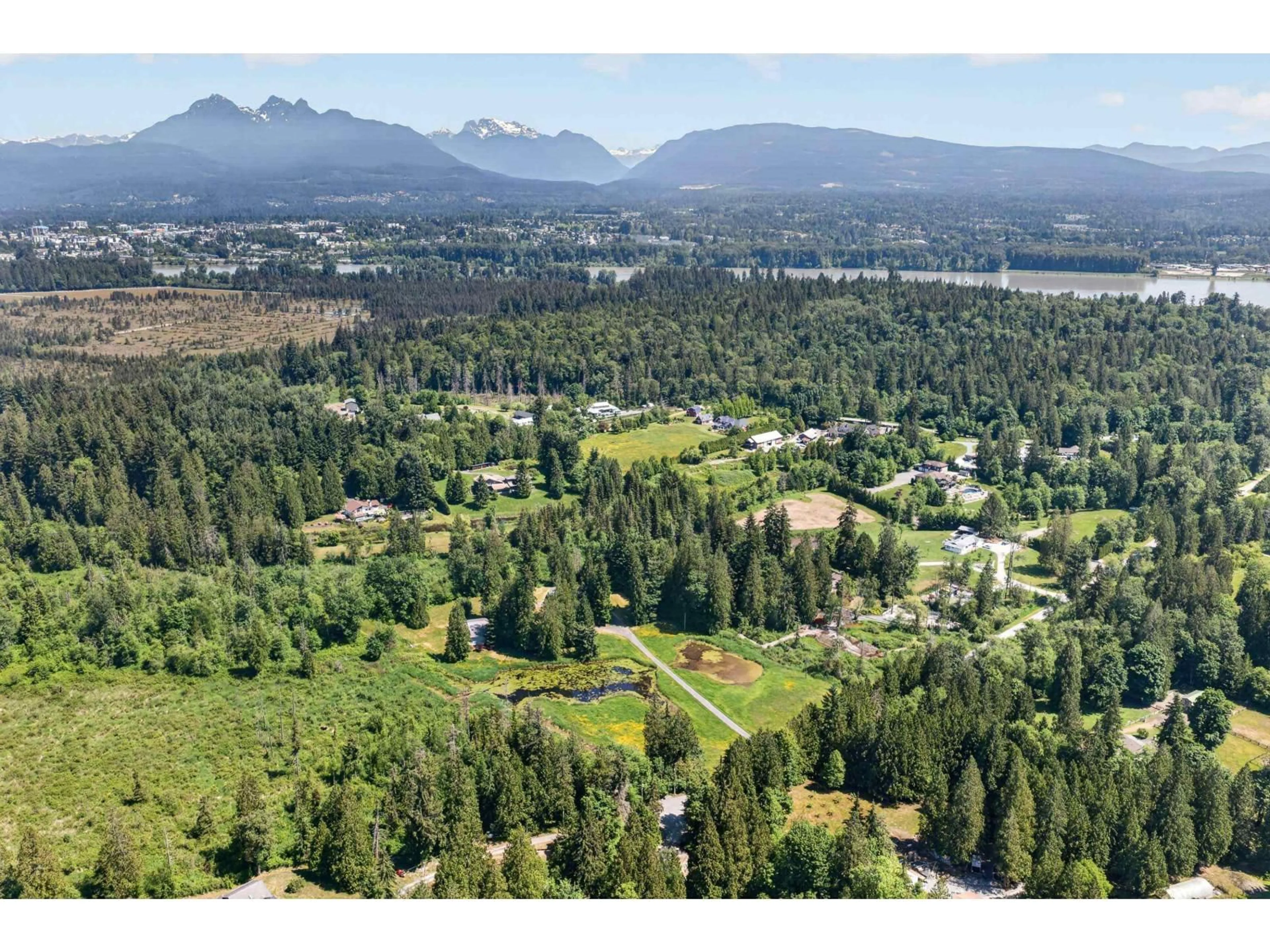 A pic from outside/outdoor area/front of a property/back of a property/a pic from drone, mountain view for 22065 102 AVENUE, Langley British Columbia V1M3V3