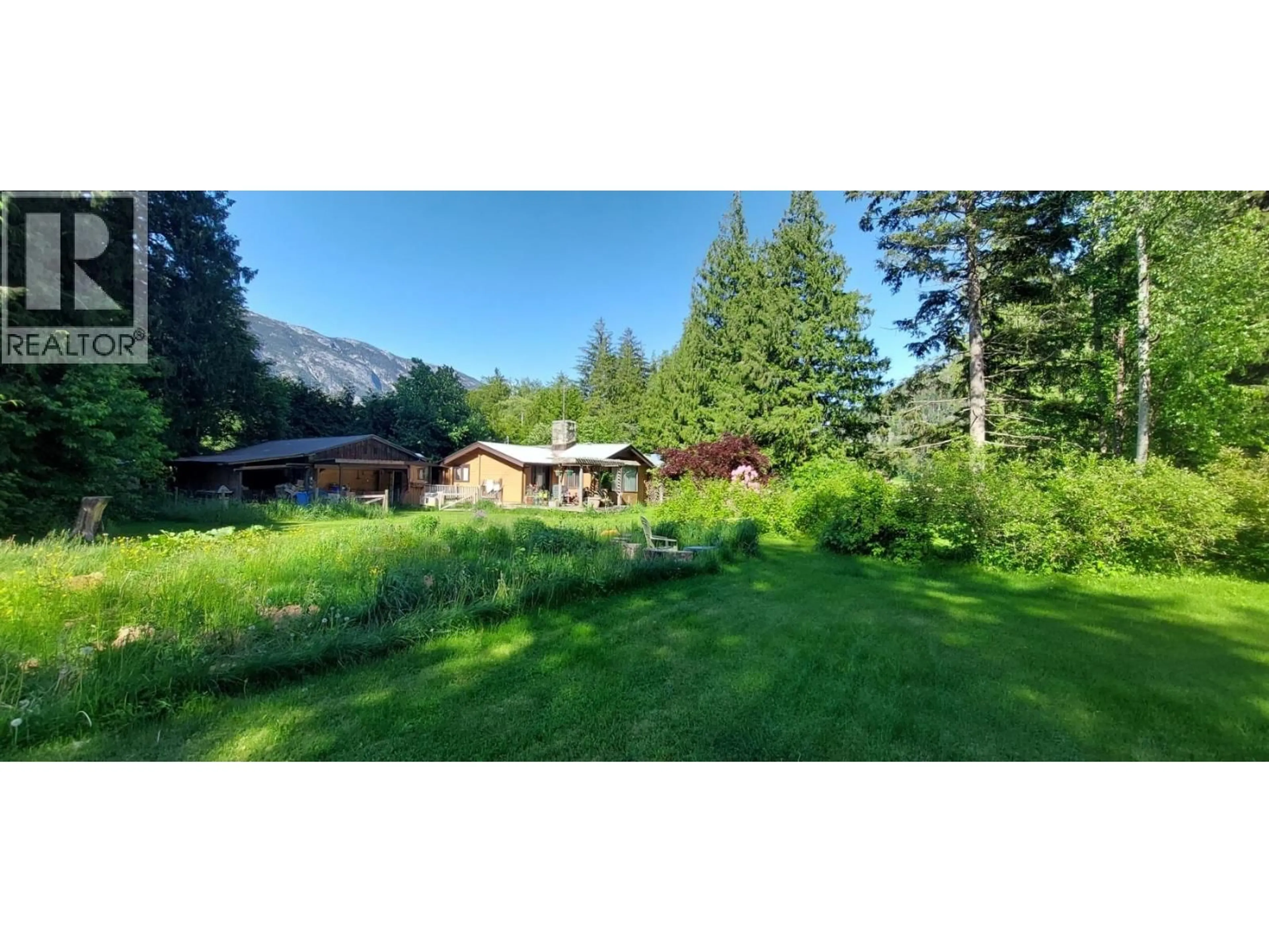 A pic from outside/outdoor area/front of a property/back of a property/a pic from drone, mountain view for 1156 MACK ROAD, Bella Coola British Columbia V0T1C0