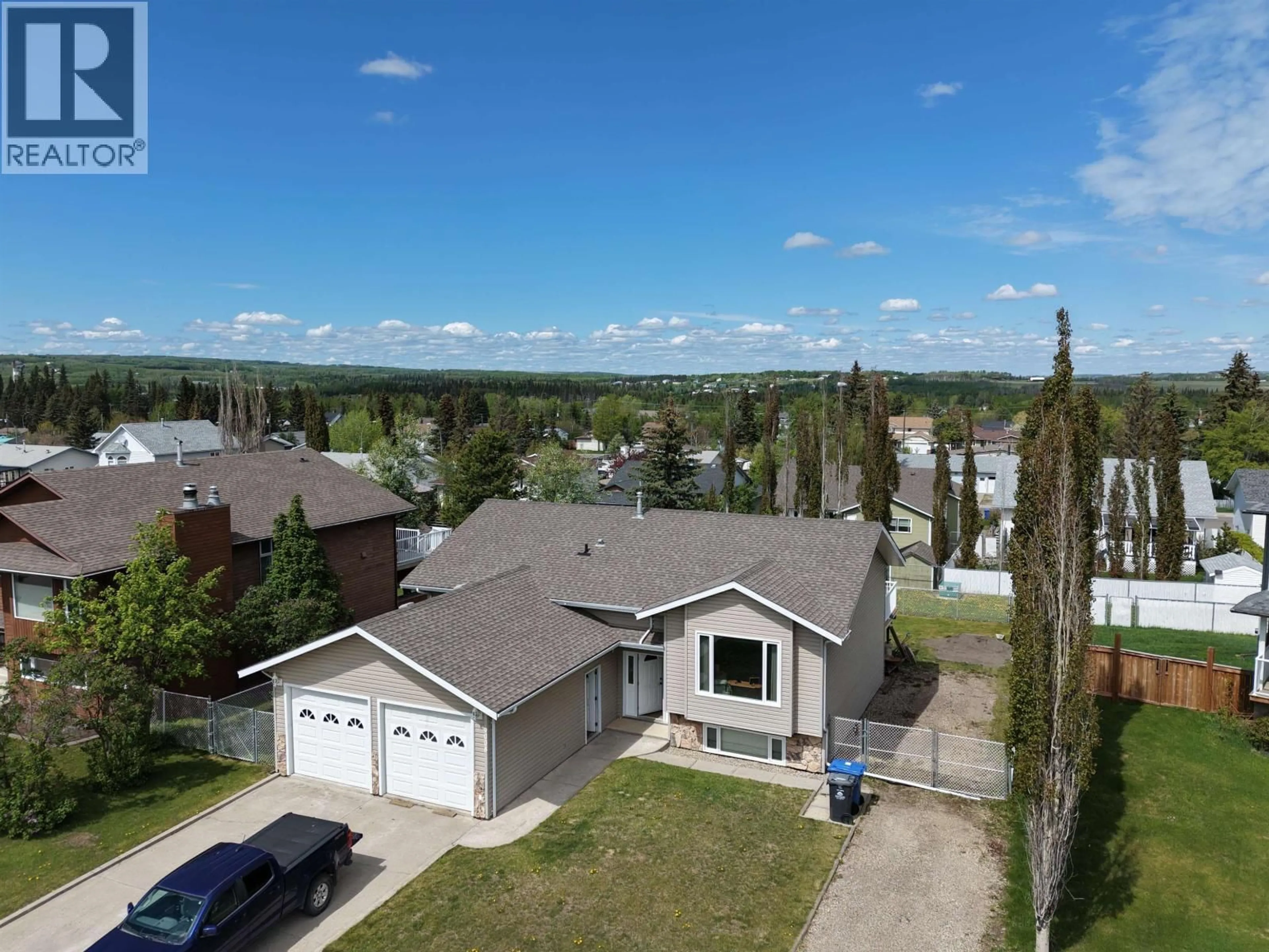 A pic from outside/outdoor area/front of a property/back of a property/a pic from drone, unknown for 9008 114 AVENUE, Fort St. John British Columbia V1J5J1