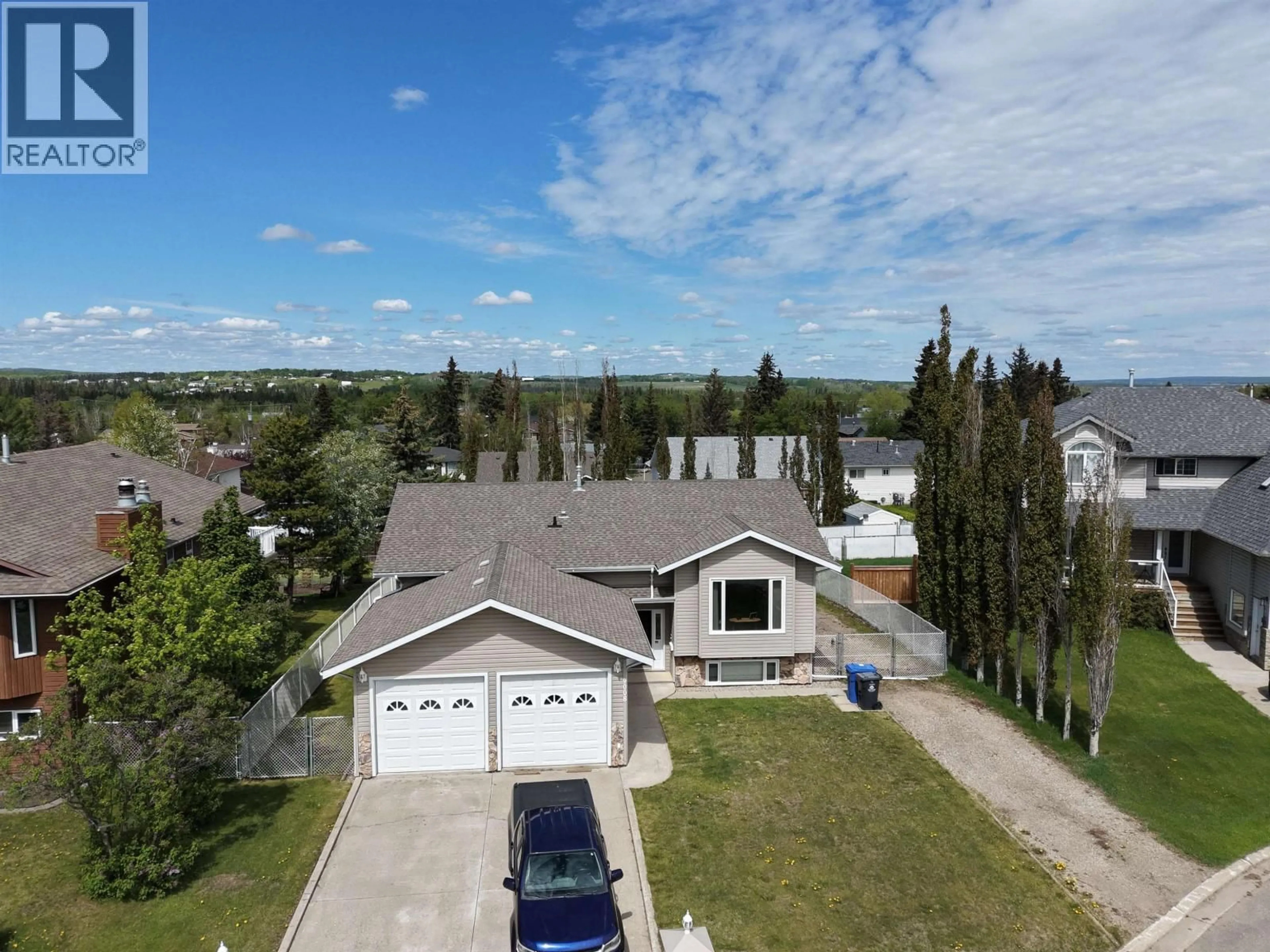 A pic from outside/outdoor area/front of a property/back of a property/a pic from drone, unknown for 9008 114 AVENUE, Fort St. John British Columbia V1J5J1