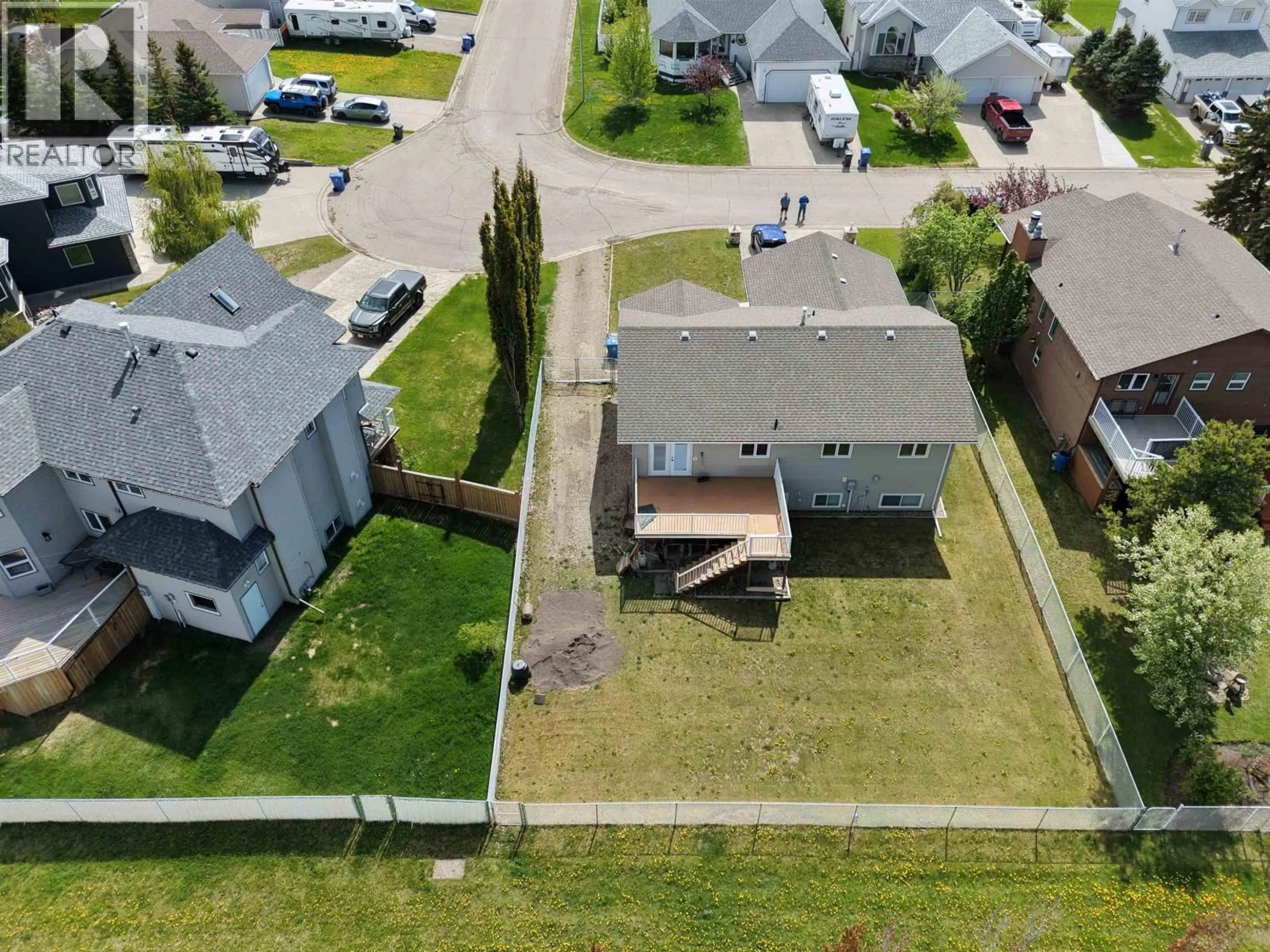 A pic from outside/outdoor area/front of a property/back of a property/a pic from drone, street for 9008 114 AVENUE, Fort St. John British Columbia V1J5J1