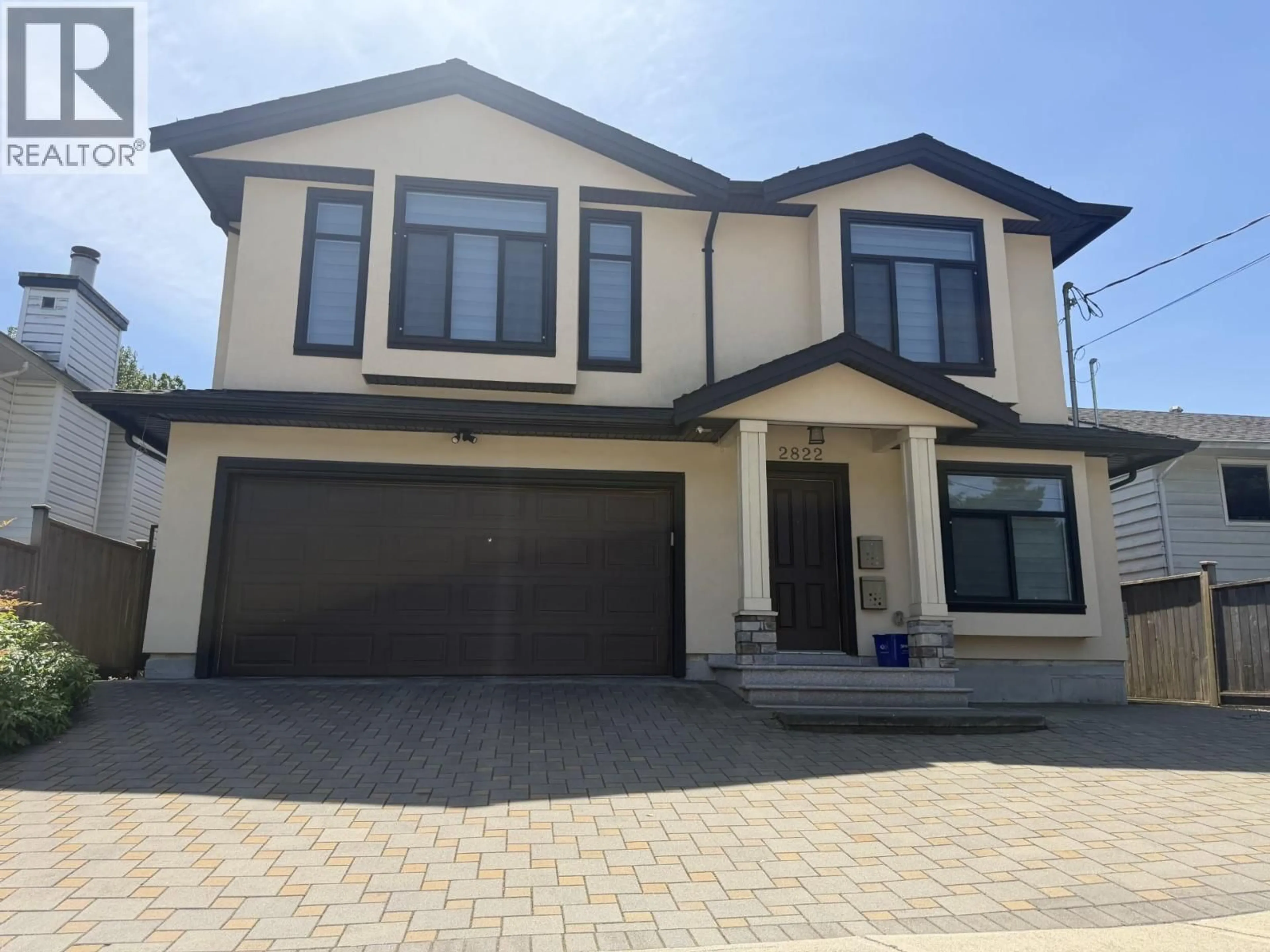 Home with vinyl exterior material, street for 2822 GLEN DRIVE, Coquitlam British Columbia V3B0A4