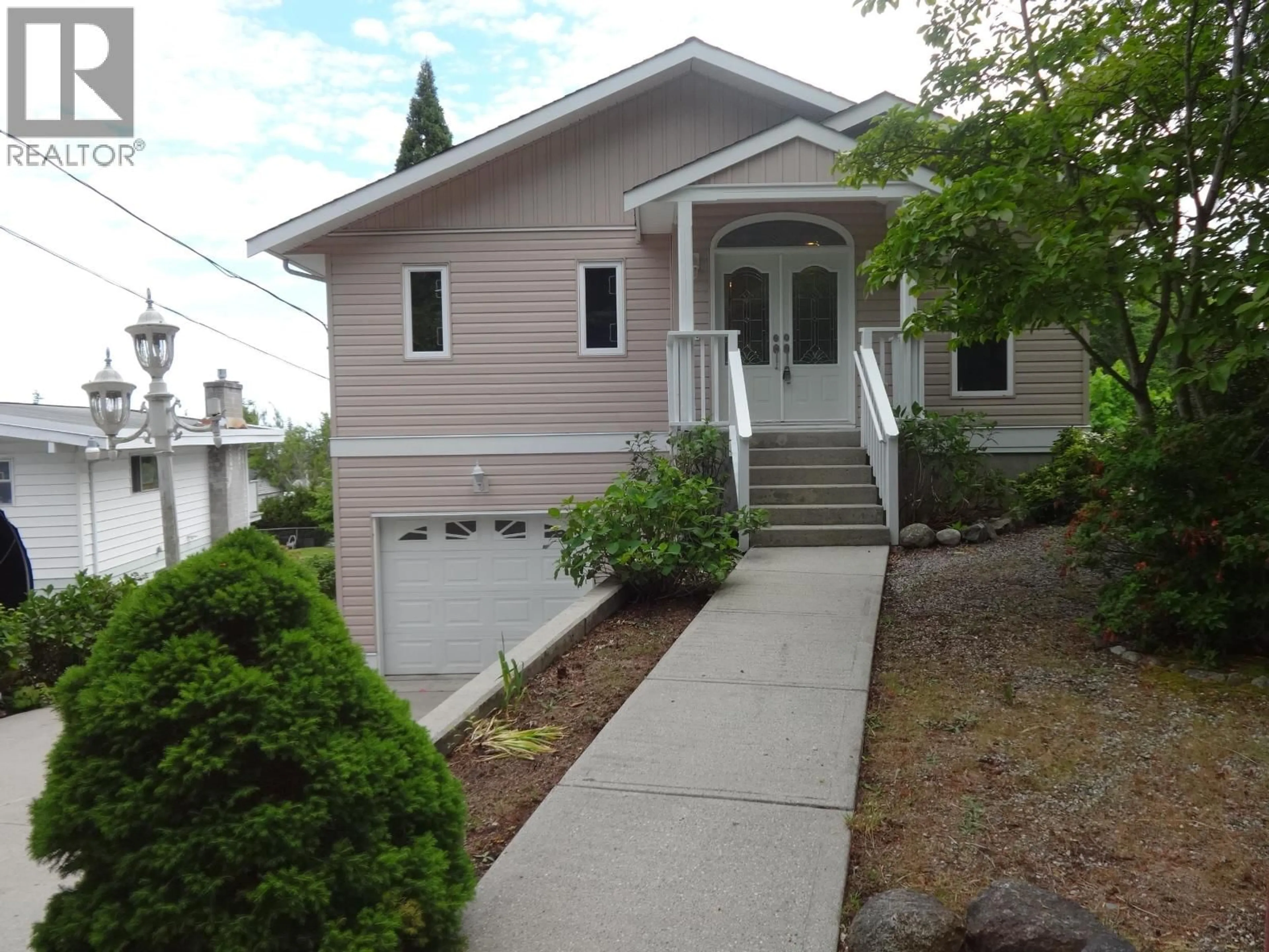 Home with vinyl exterior material, street for 6217 NORWEST BAY ROAD, Sechelt British Columbia V7Z0M2