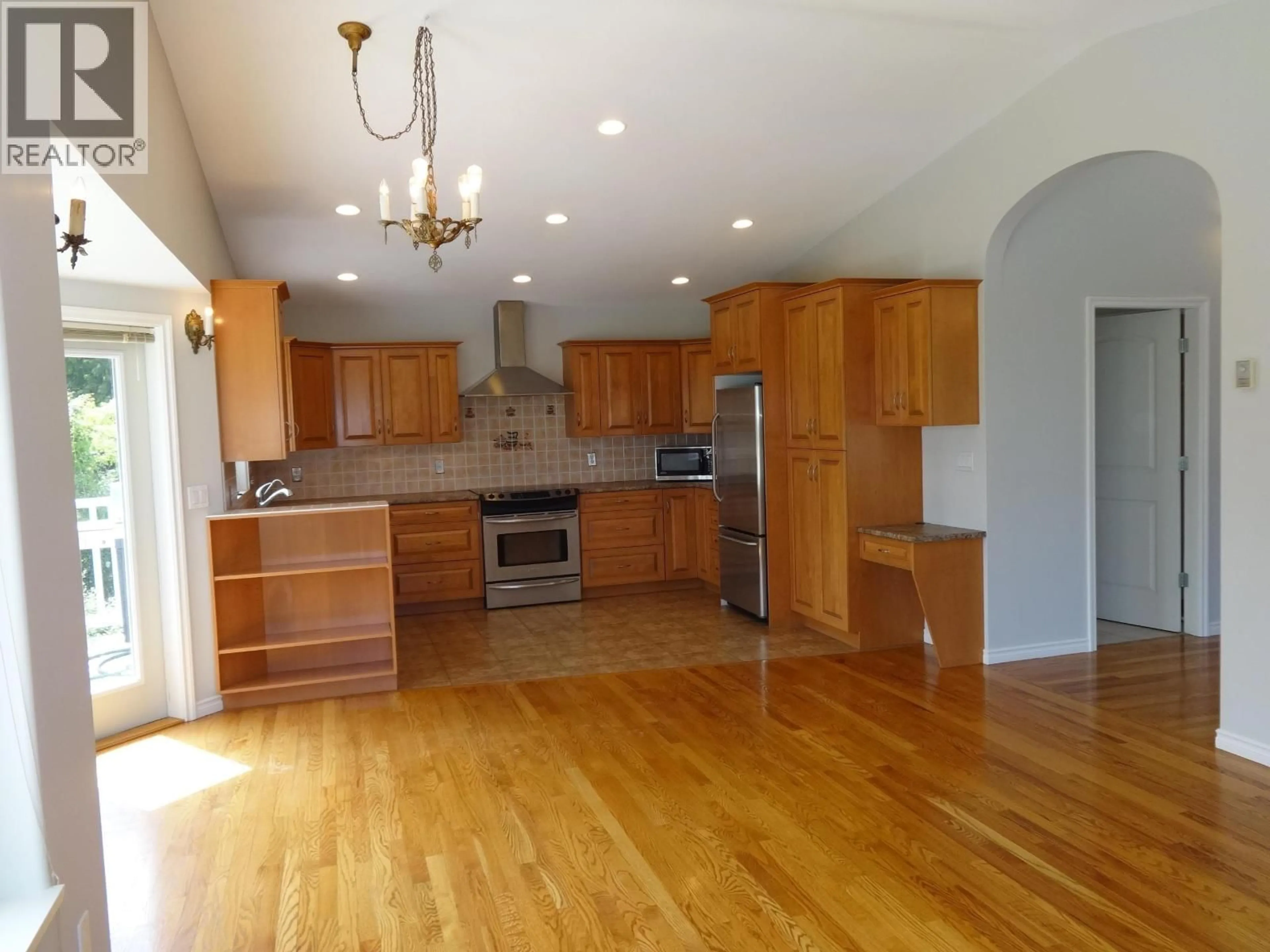 Open concept kitchen, wood/laminate floor for 6217 NORWEST BAY ROAD, Sechelt British Columbia V7Z0M2