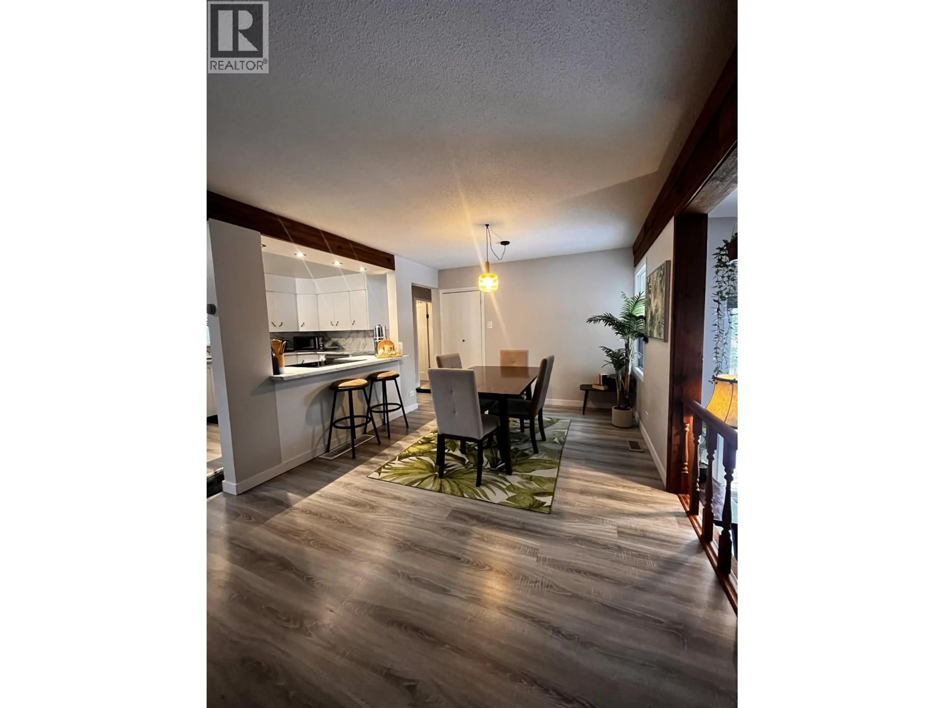 Open concept kitchen, wood/laminate floor for 5609 LEHMAN STREET, Prince George British Columbia V2K1T8