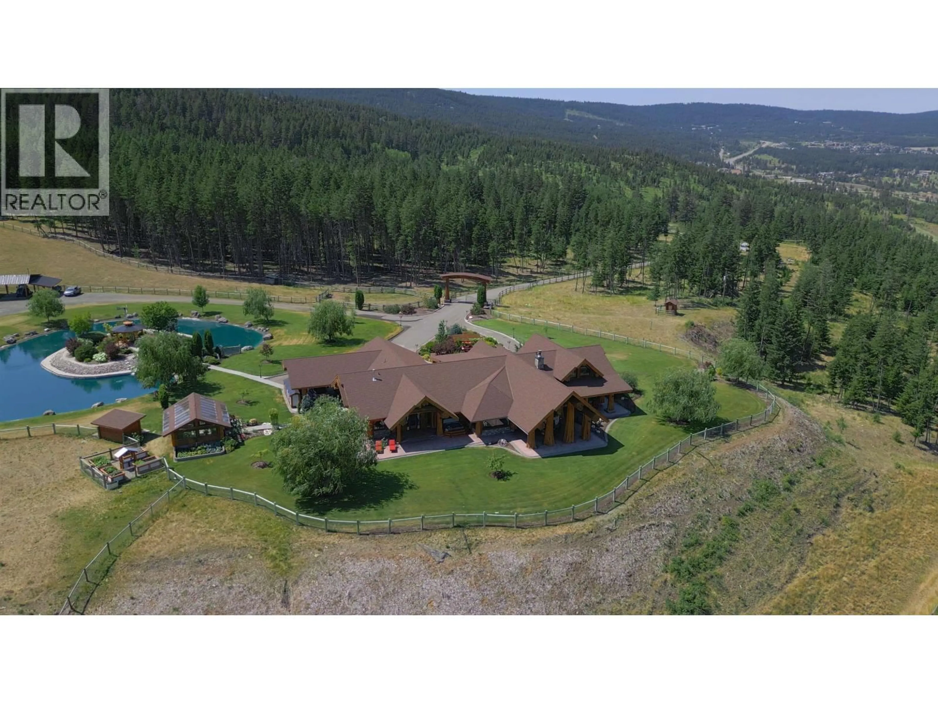 A pic from outside/outdoor area/front of a property/back of a property/a pic from drone, mountain view for 1255 PROSPERITY WAY, Williams Lake British Columbia V2G0A6