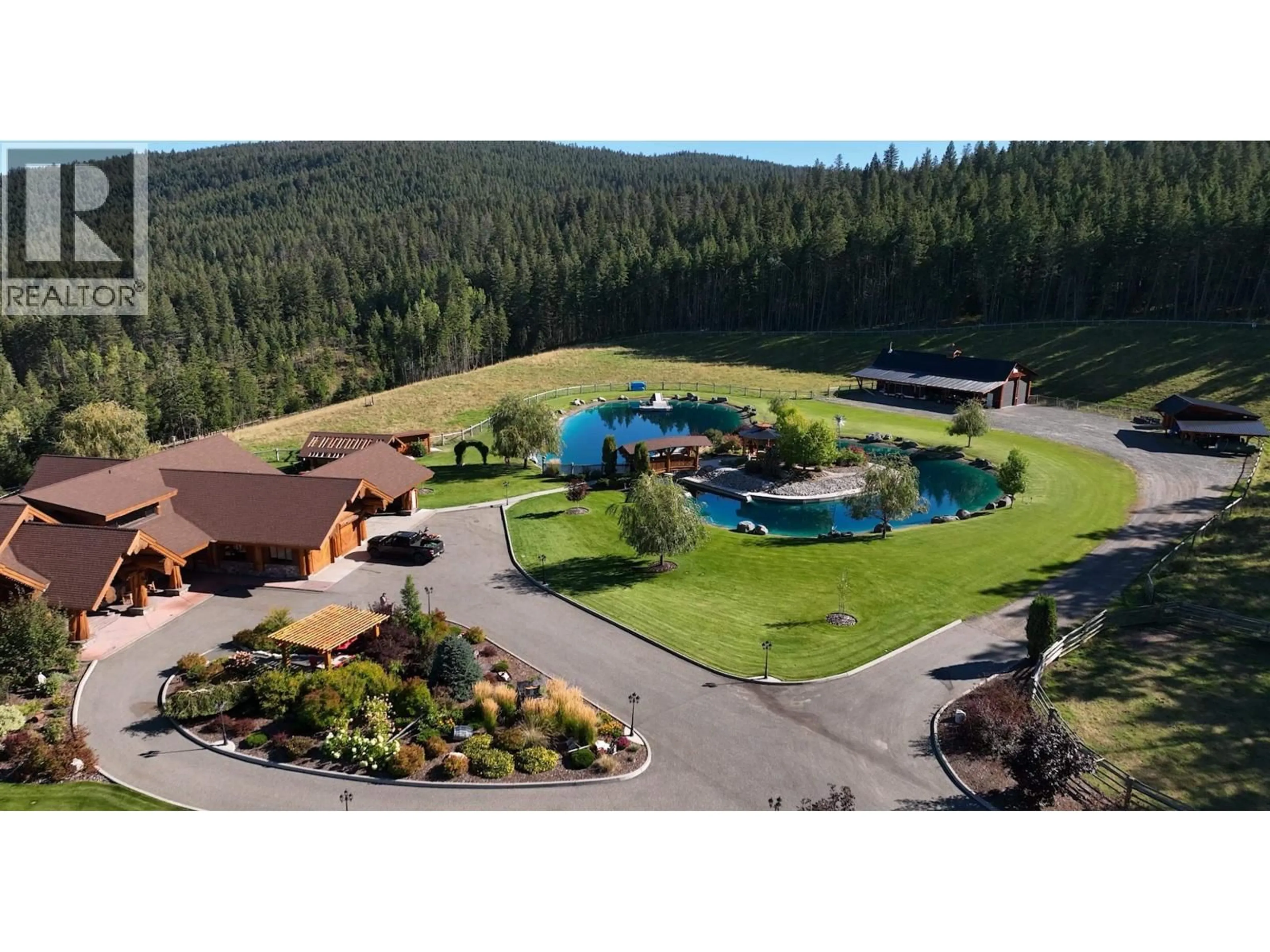 A pic from outside/outdoor area/front of a property/back of a property/a pic from drone, water/lake/river/ocean view for 1255 PROSPERITY WAY, Williams Lake British Columbia V2G0A6