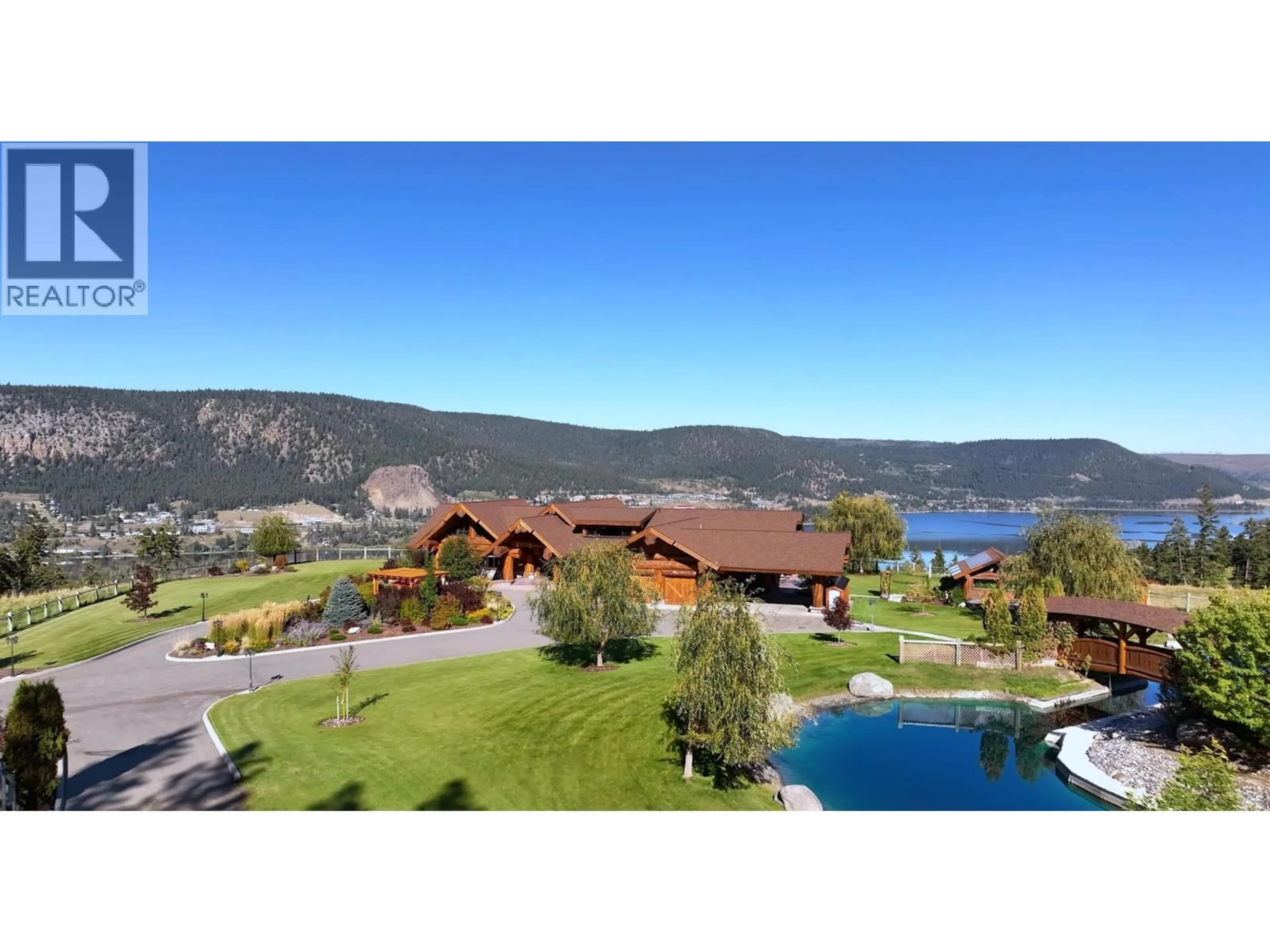 A pic from outside/outdoor area/front of a property/back of a property/a pic from drone, water/lake/river/ocean view for 1255 PROSPERITY WAY, Williams Lake British Columbia V2G0A6