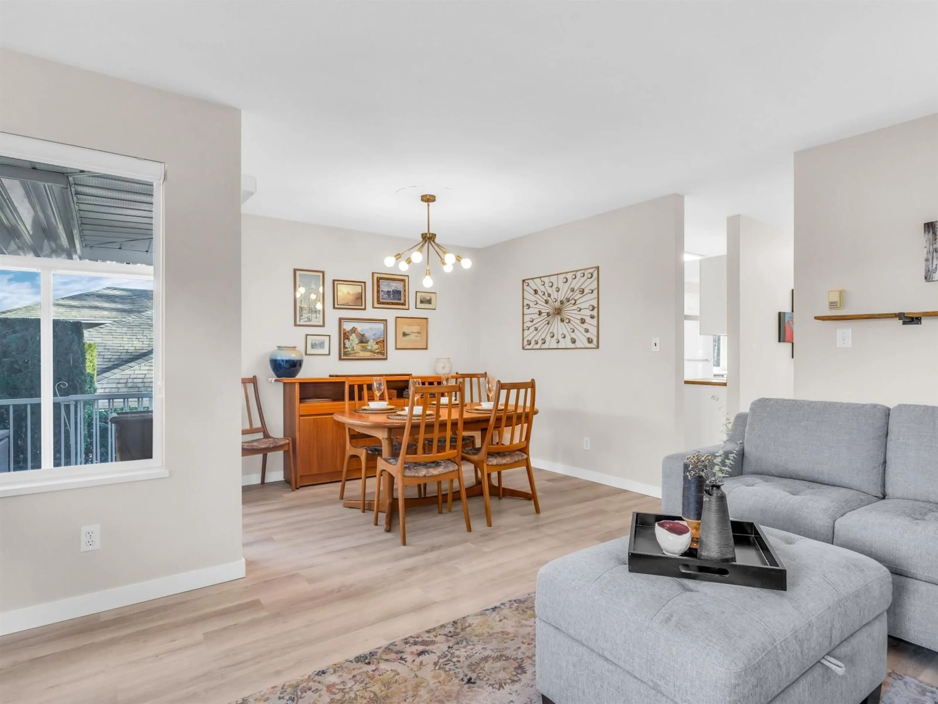 Living room with furniture, wood/laminate floor for 67 - 15020 66A AVENUE, Surrey British Columbia V3S2A5