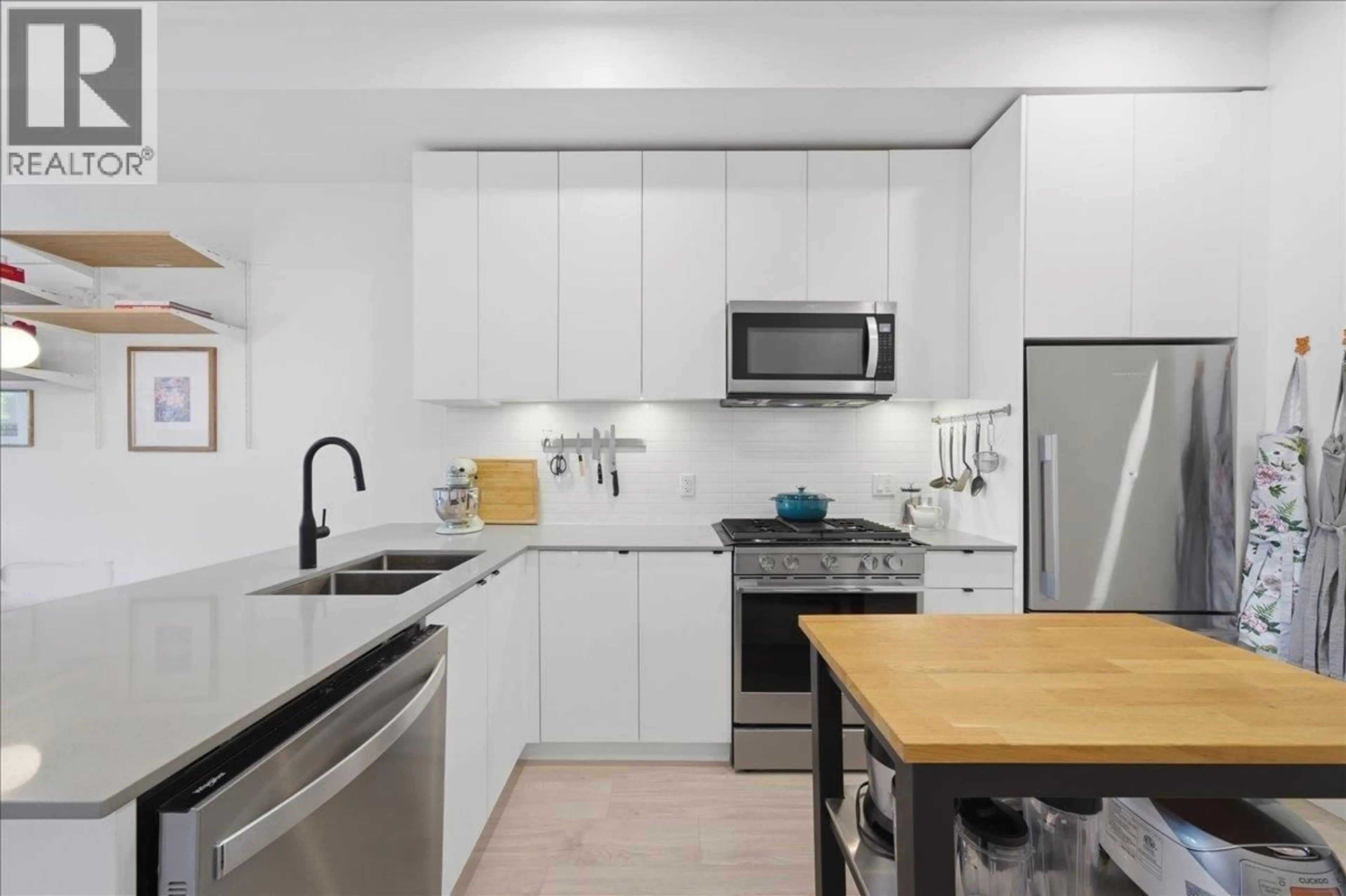 Standard kitchen, ceramic/tile floor for 104 - 2345 RINDALL AVENUE, Port Coquitlam British Columbia V3C1V3