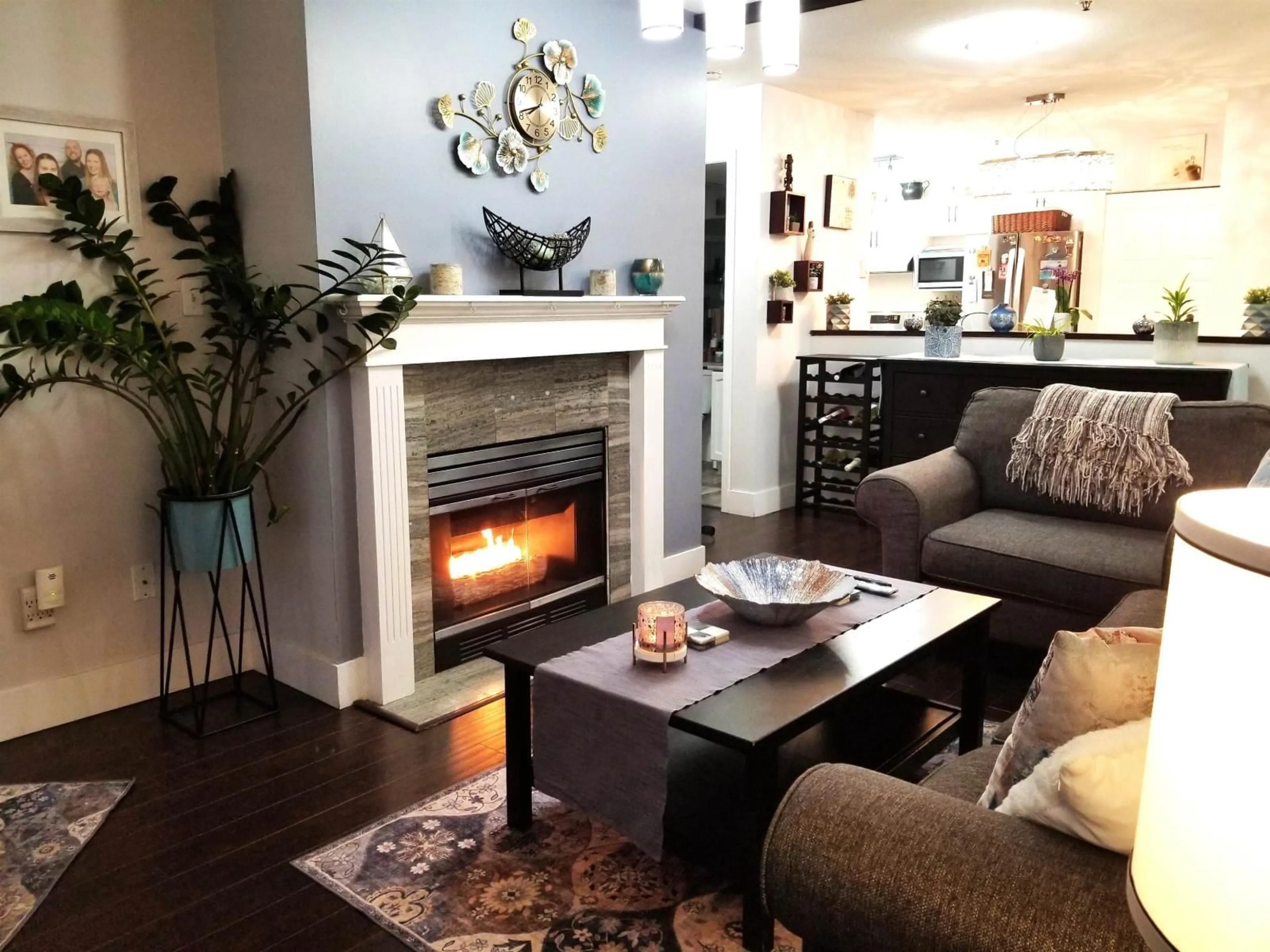 Living room with furniture, wood/laminate floor for 208 - 2964 TRETHEWEY STREET, Abbotsford British Columbia V2T6P4