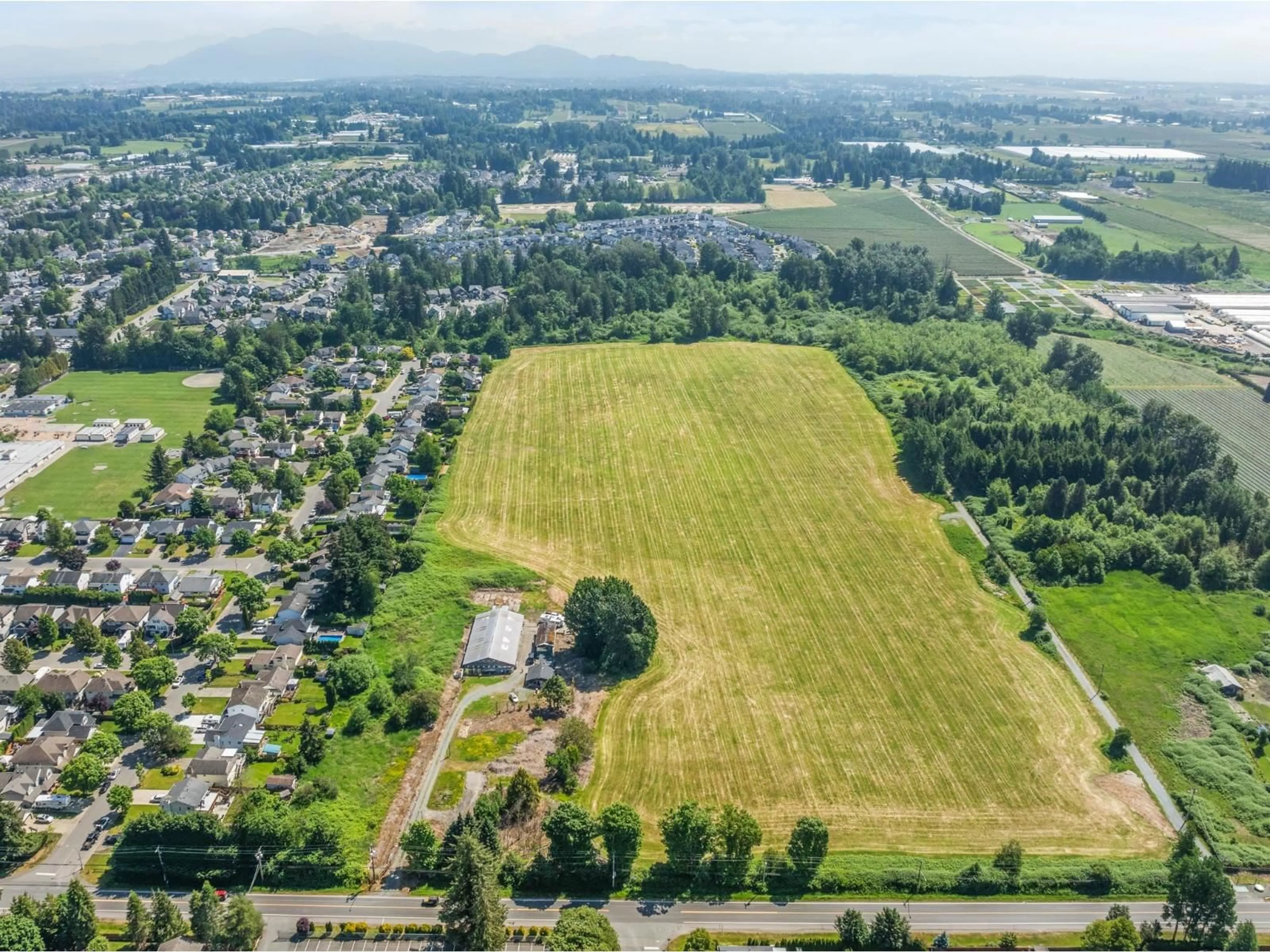 A pic from outside/outdoor area/front of a property/back of a property/a pic from drone, mountain view for 2620 272 STREET, Langley British Columbia V4W2Z2