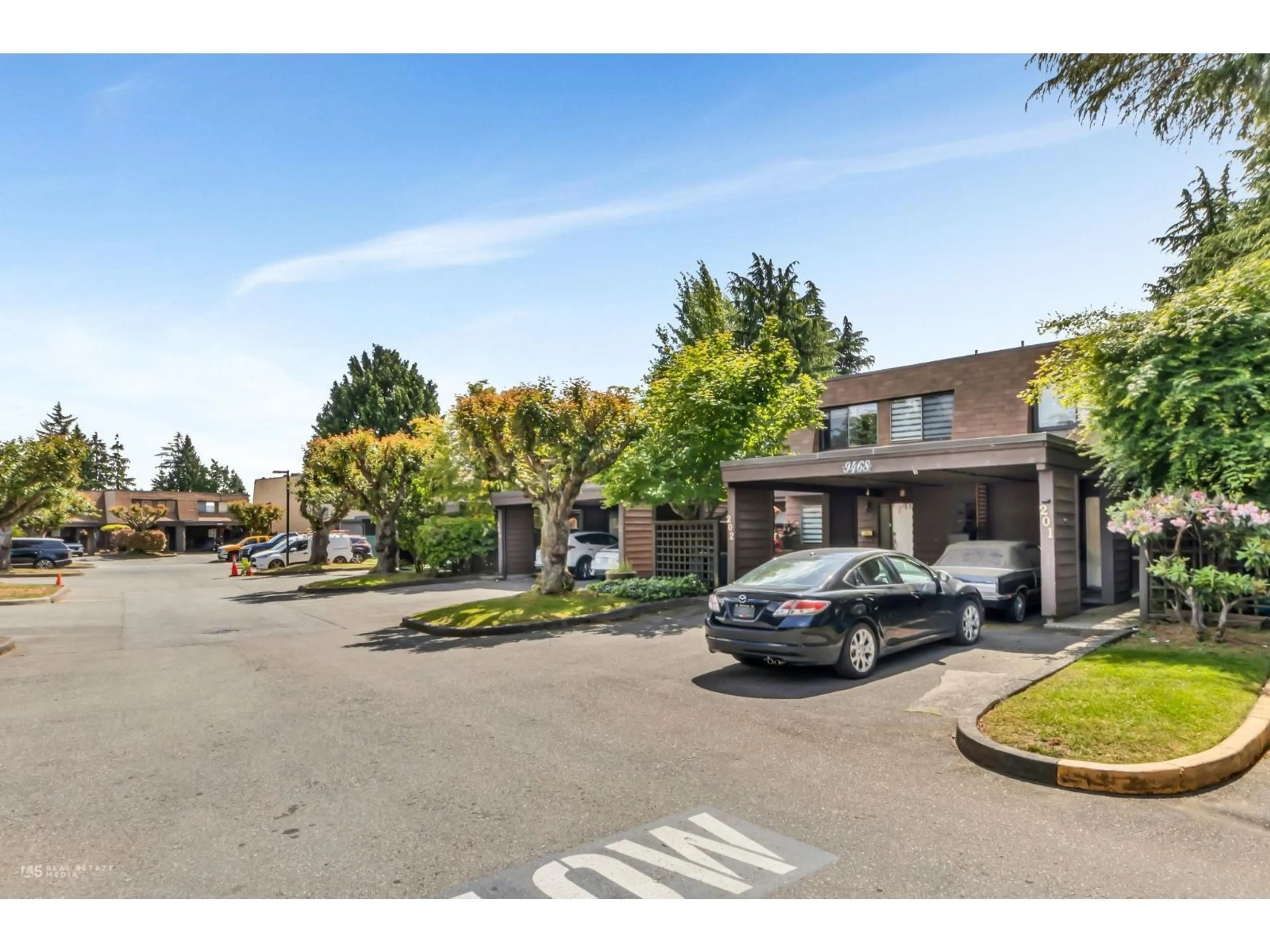 A pic from outside/outdoor area/front of a property/back of a property/a pic from drone, unknown for 202 - 9468 PRINCE CHARLES BOULEVARD, Surrey British Columbia V3V1S6