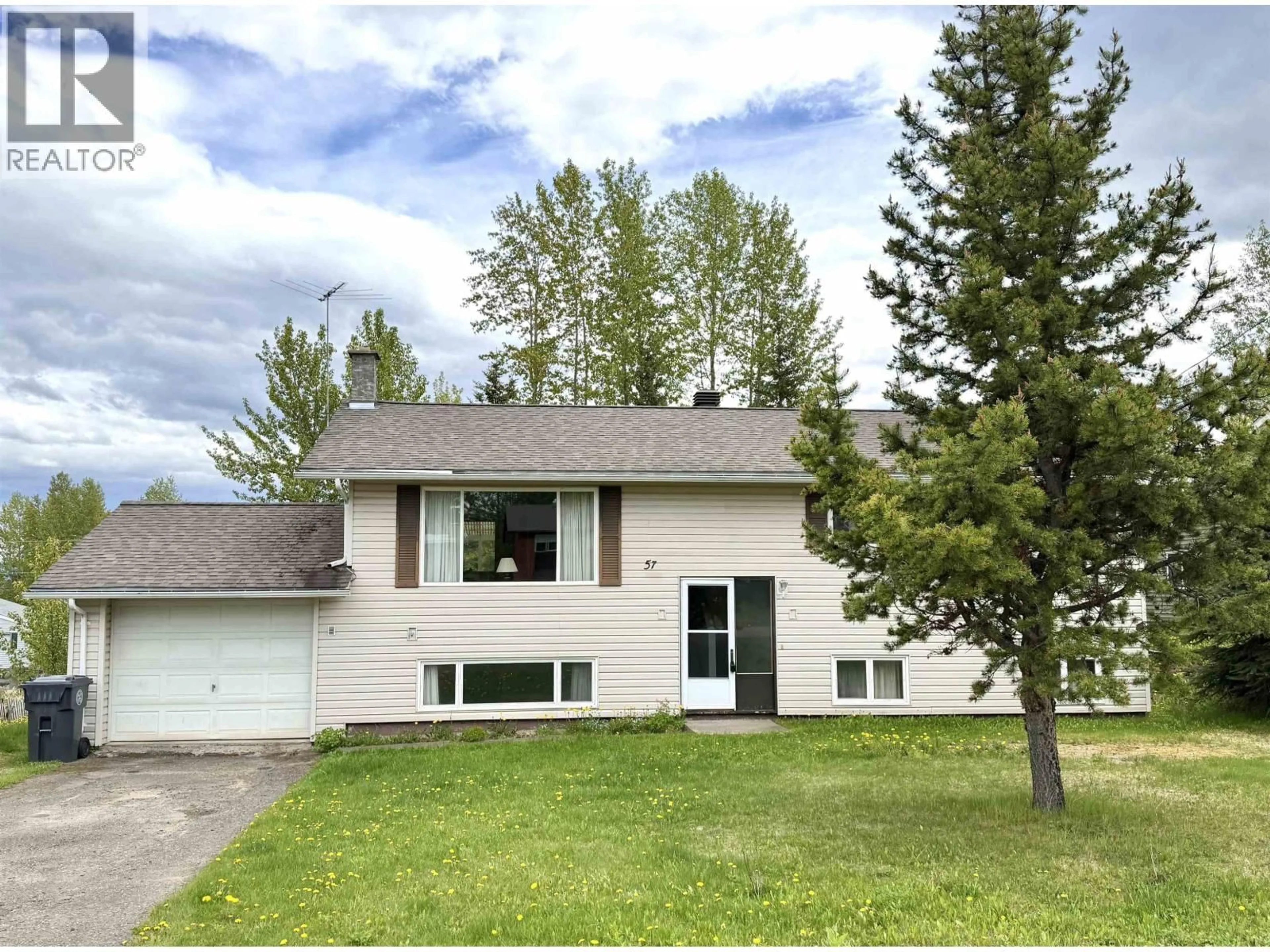 Home with vinyl exterior material, street for 57 CHAPMAN STREET, Granisle British Columbia V0J1W0