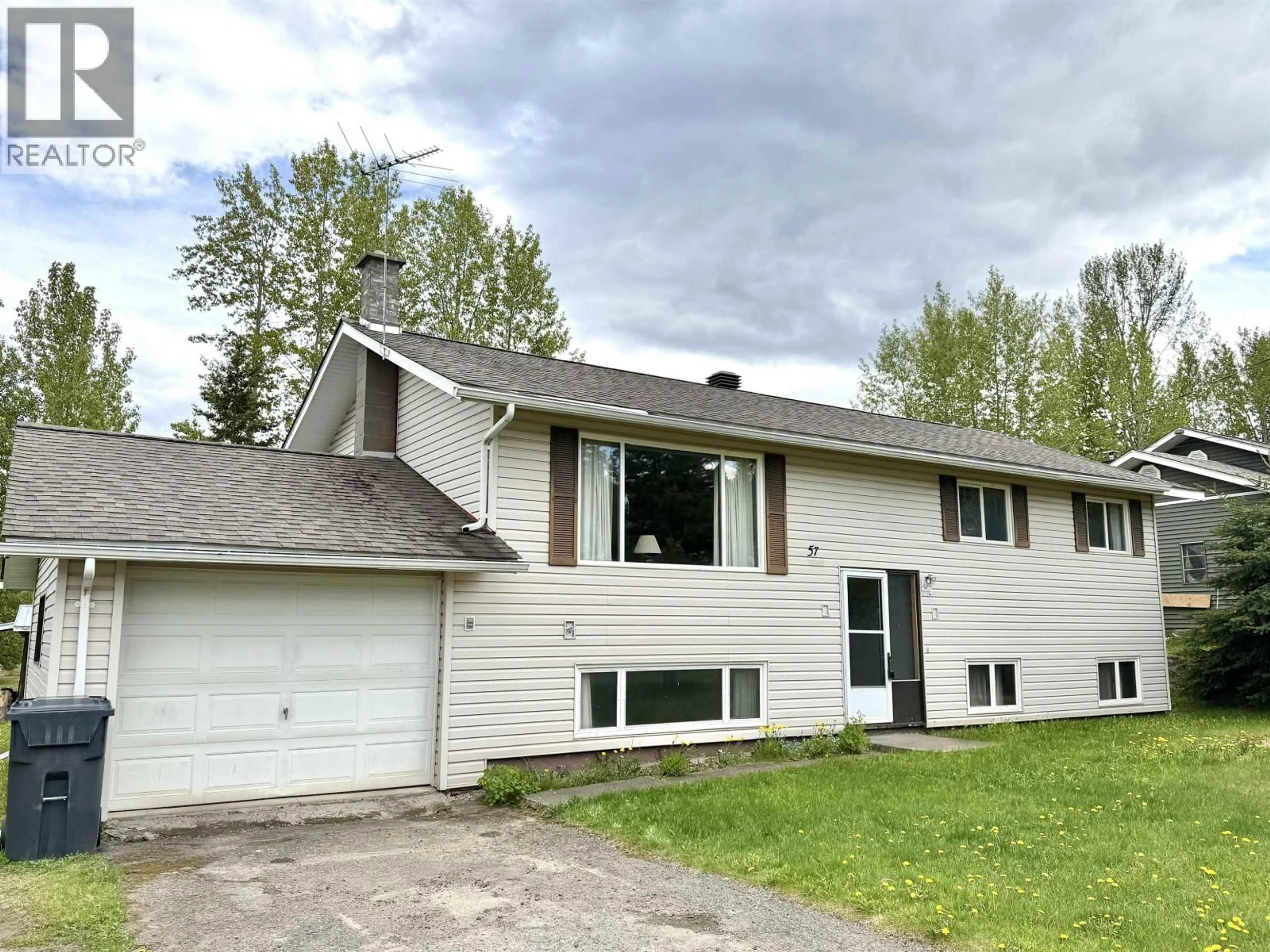Home with vinyl exterior material, street for 57 CHAPMAN STREET, Granisle British Columbia V0J1W0