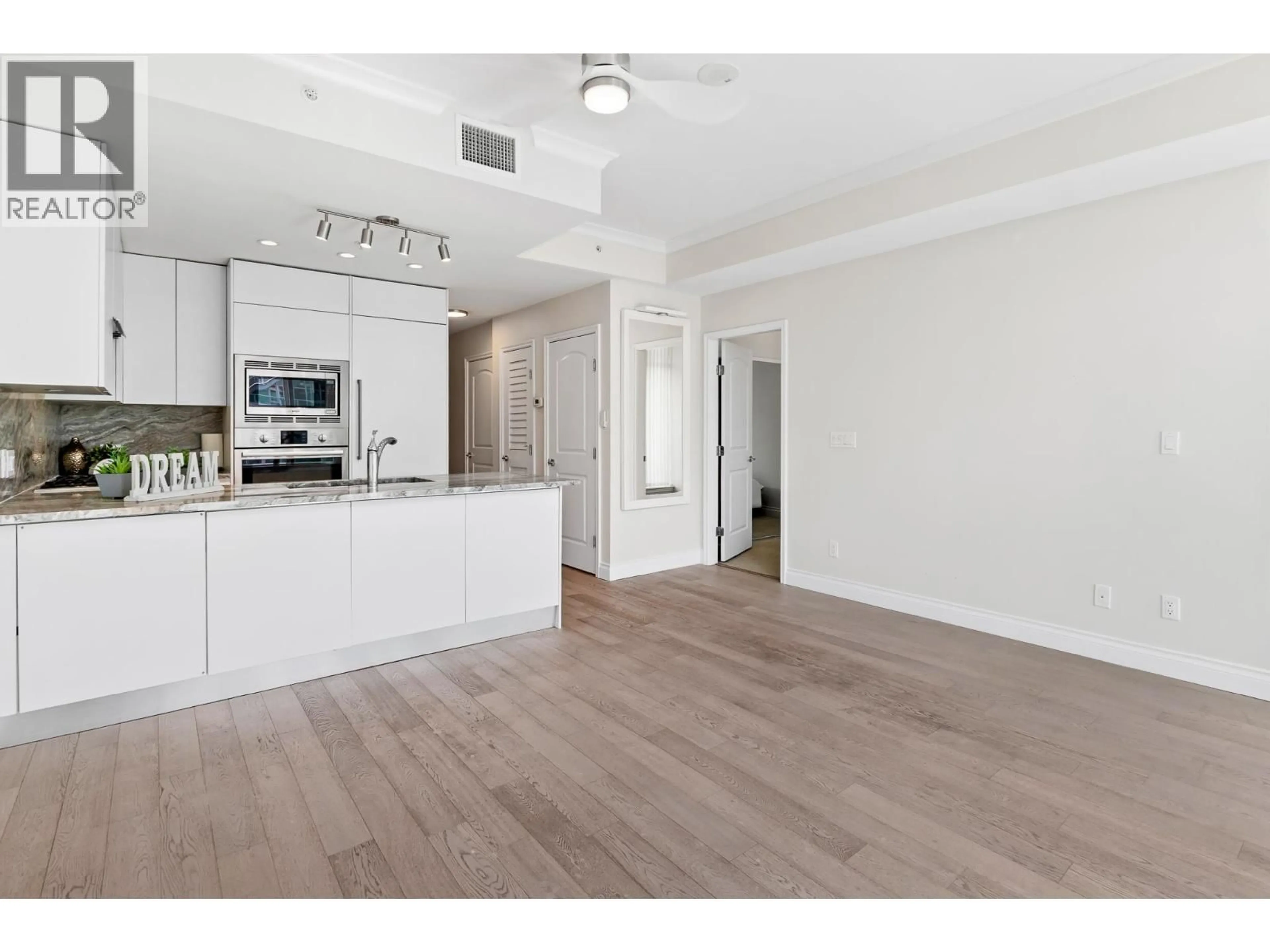 Open concept kitchen, unknown for 901 - 175 VICTORY SHIP WAY, North Vancouver British Columbia V7L0G1
