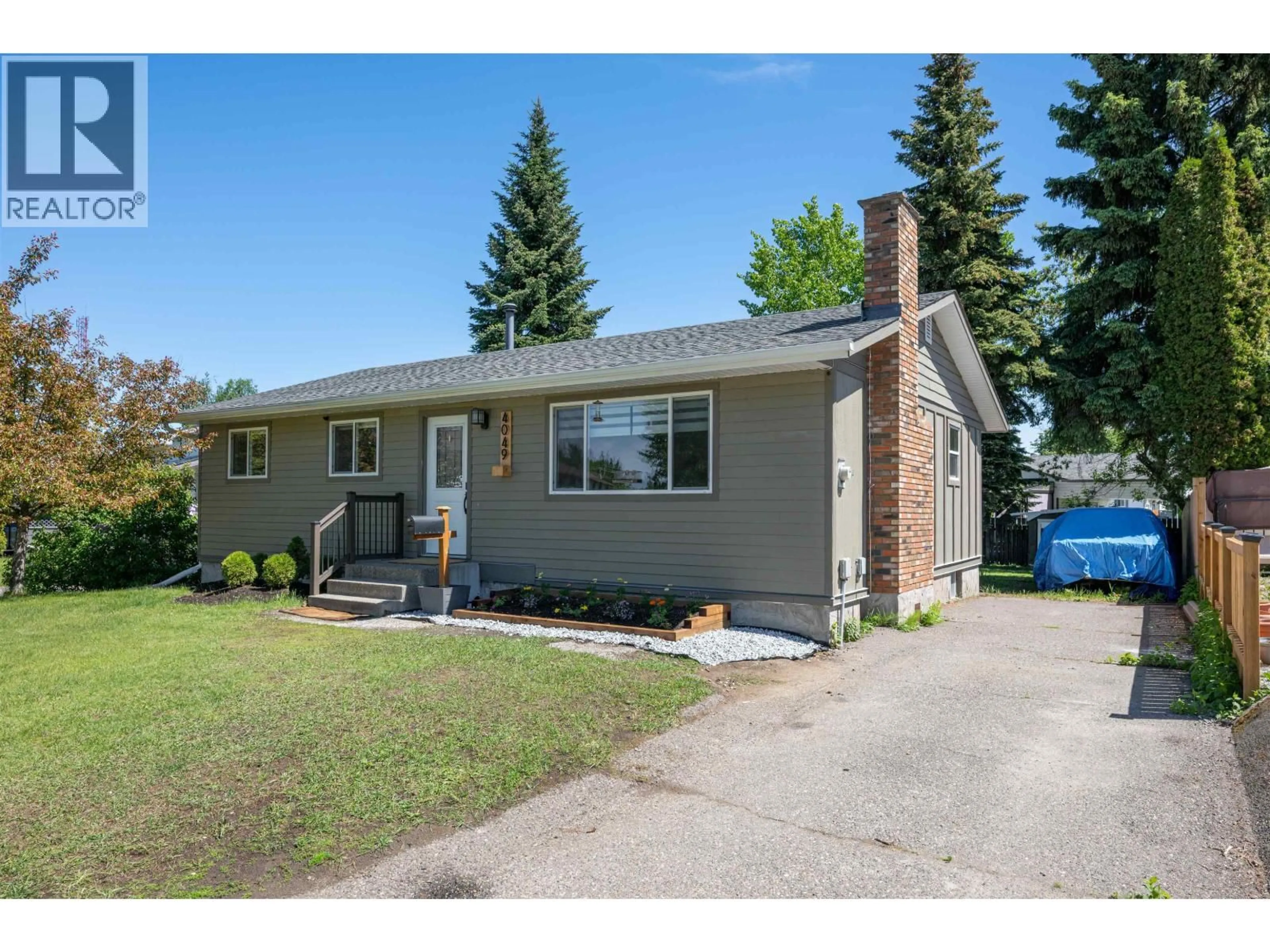 Home with vinyl exterior material, street for 4049 CAMPBELL AVENUE, Prince George British Columbia V2N2Y3