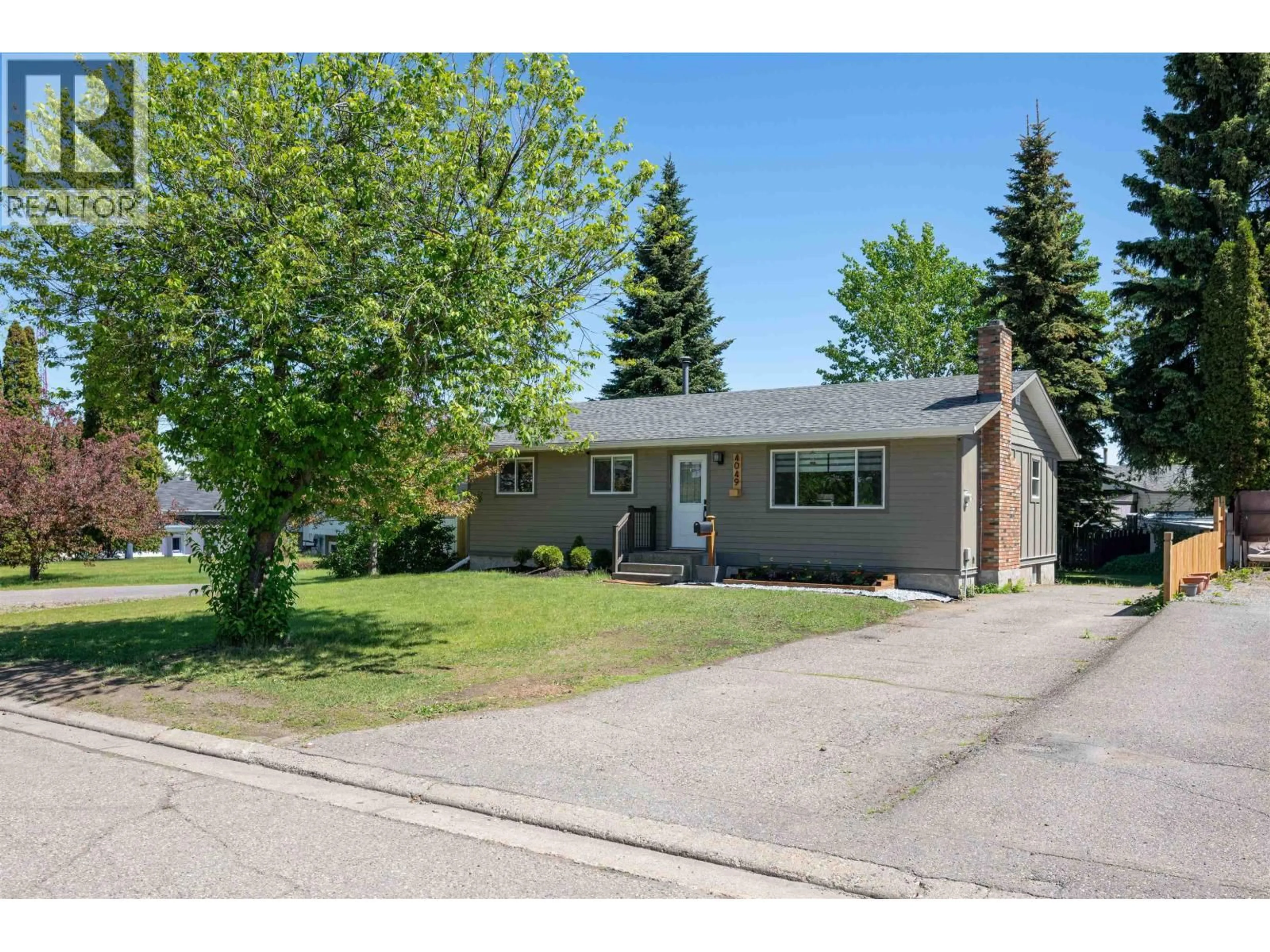 Home with vinyl exterior material, street for 4049 CAMPBELL AVENUE, Prince George British Columbia V2N2Y3