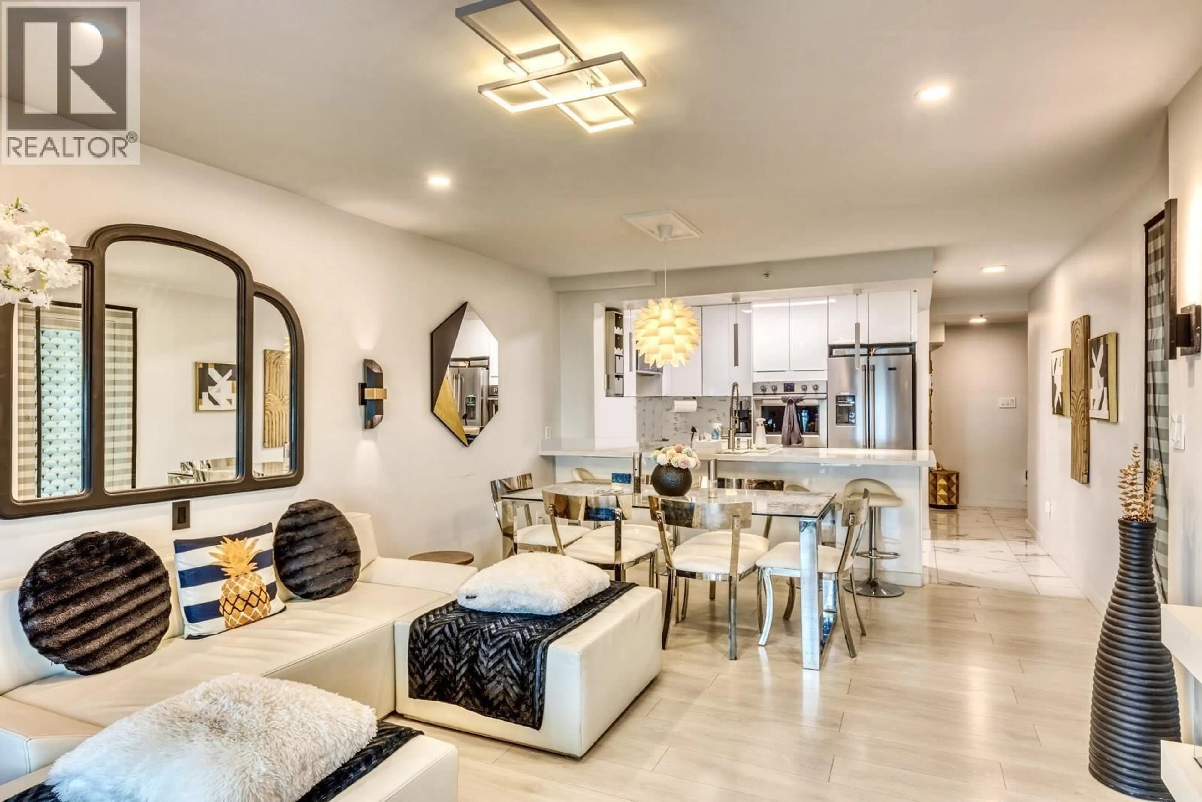 Open concept kitchen, ceramic/tile floor for 704 - 2468 BROADWAY, Vancouver British Columbia V5M4V1