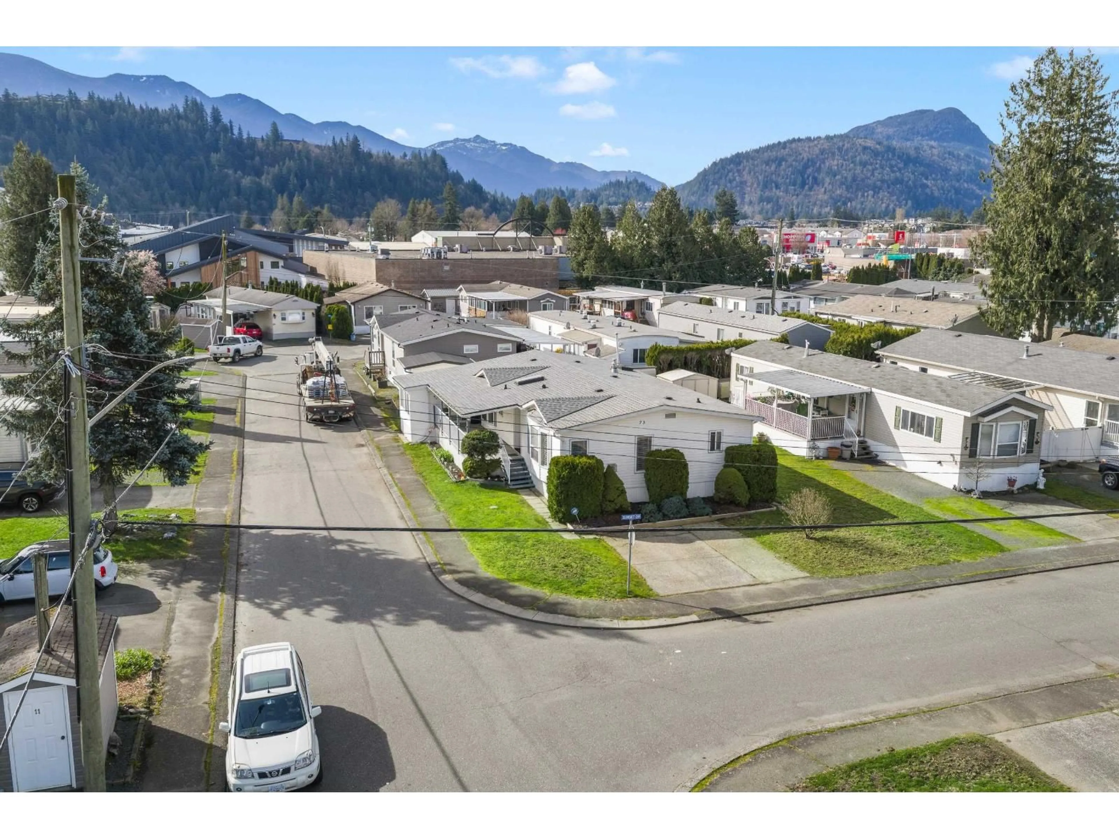 A pic from outside/outdoor area/front of a property/back of a property/a pic from drone, mountain view for 73 - 6338 VEDDER ROAD, Chilliwack British Columbia V2R3R3