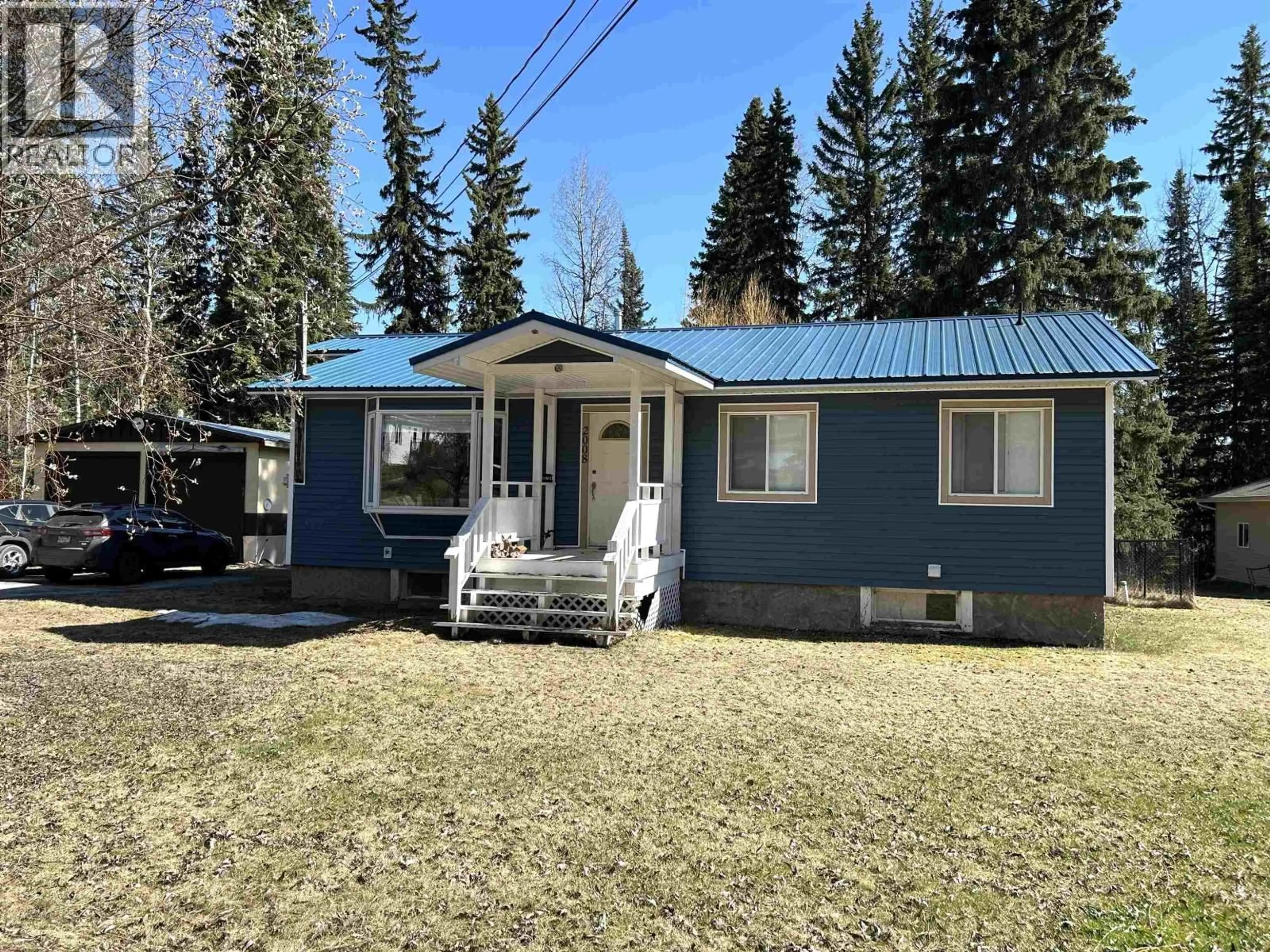Home with vinyl exterior material, street for 2008 SOMMERVILLE ROAD, Prince George British Columbia V2N6T6