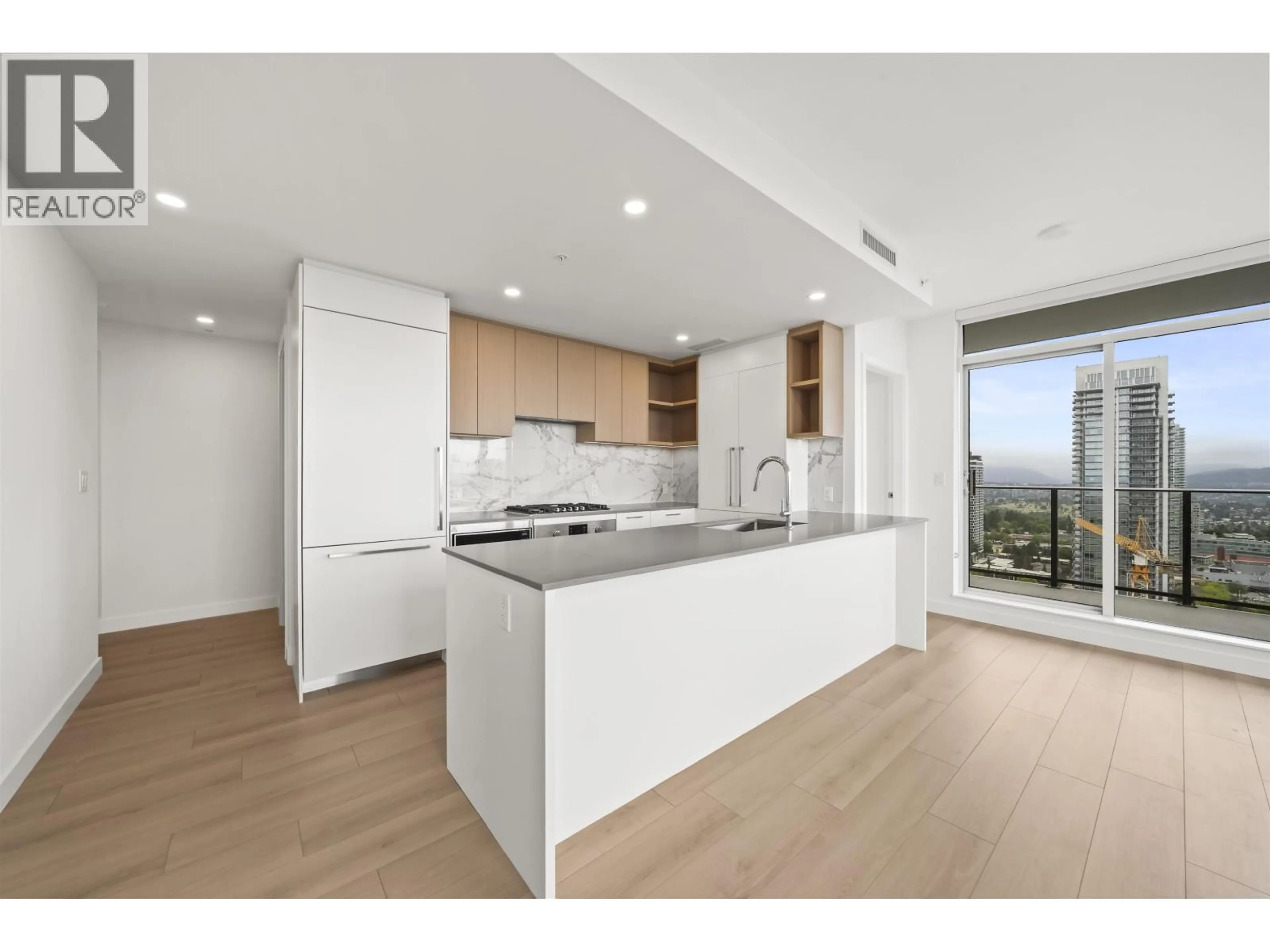 Open concept kitchen, wood/laminate floor for 2809 - 6468 WILLINGDON AVENUE, Burnaby British Columbia V5H0L3
