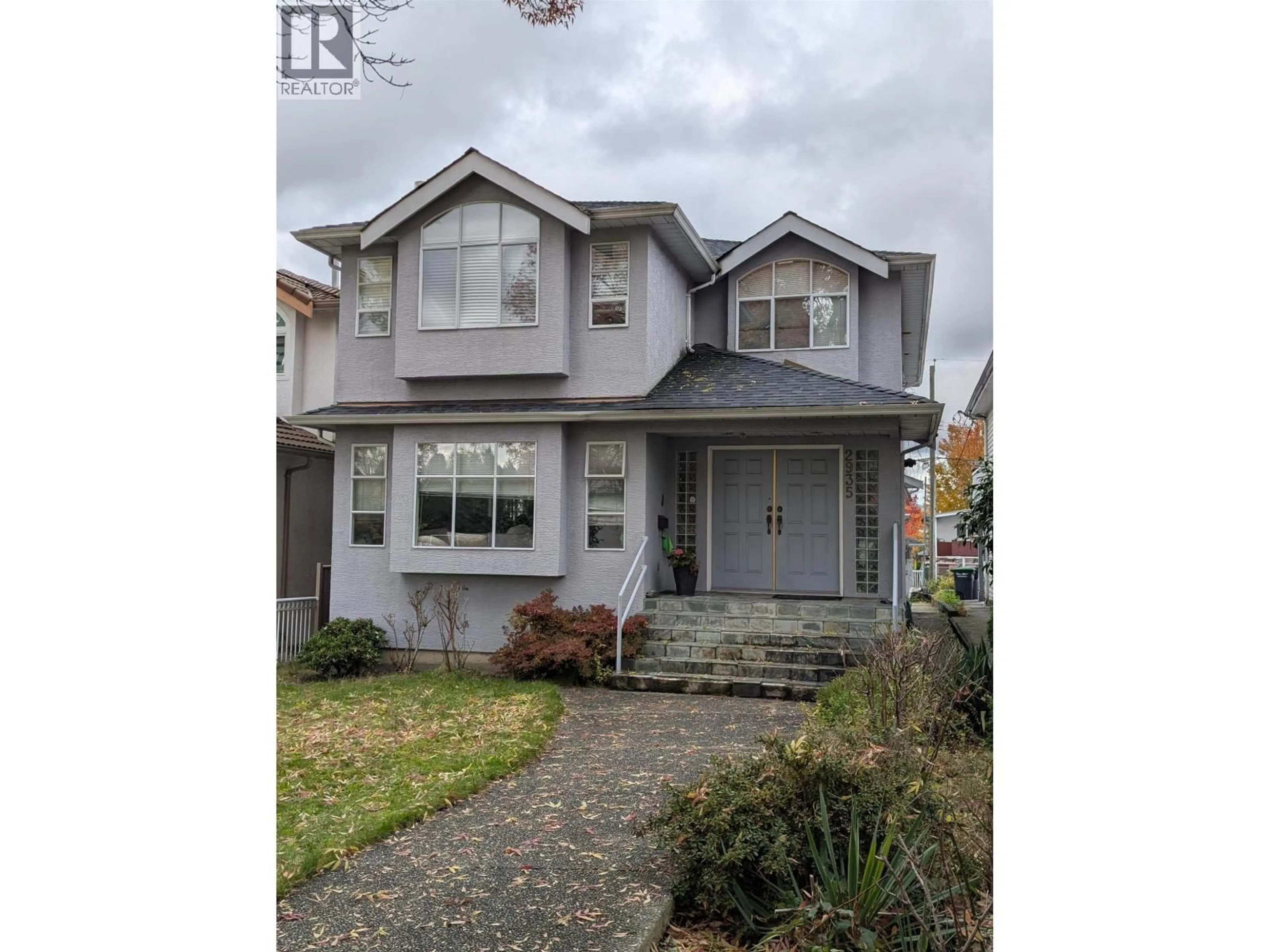 Home with vinyl exterior material, street for 2935 17TH AVENUE, Vancouver British Columbia V5M2N4