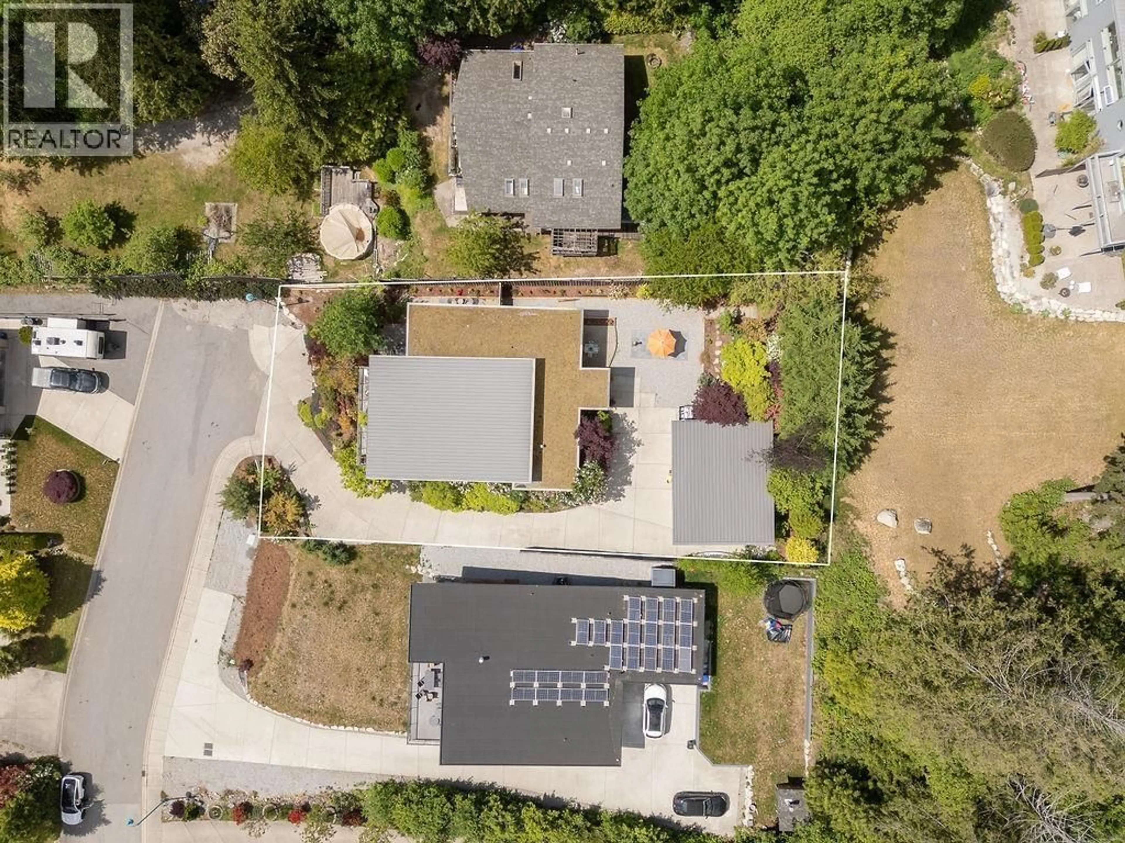 A pic from outside/outdoor area/front of a property/back of a property/a pic from drone, street for 6260 SUNRISE BOULEVARD, Sechelt British Columbia V7Z0R5
