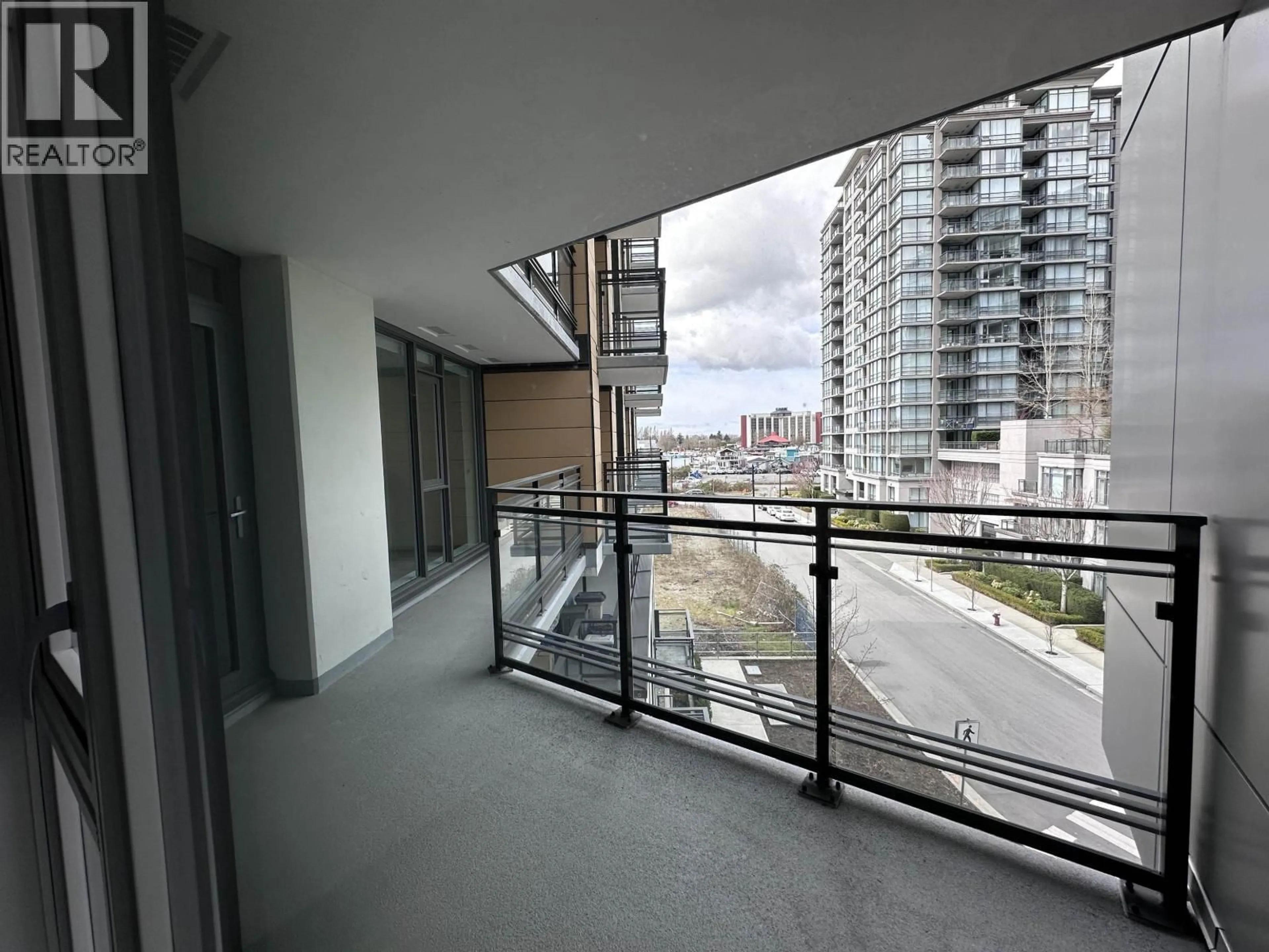 Balcony in the apartment, city buildings view from balcony for 505 - 3280 CORVETTE WAY, Richmond British Columbia V6X0T9