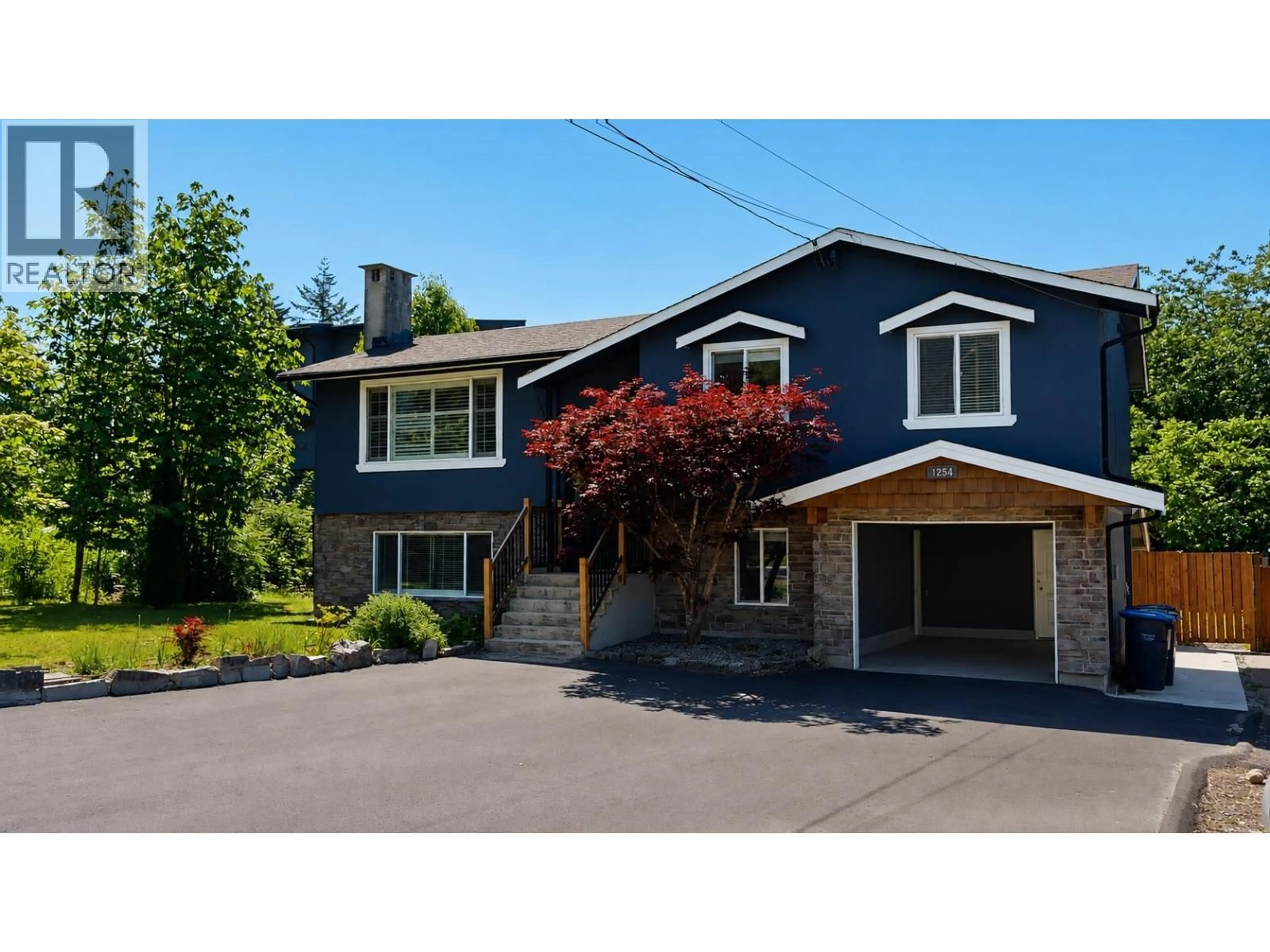 Home with vinyl exterior material, street for 1254 DEPOT ROAD, Squamish British Columbia V0N1H0