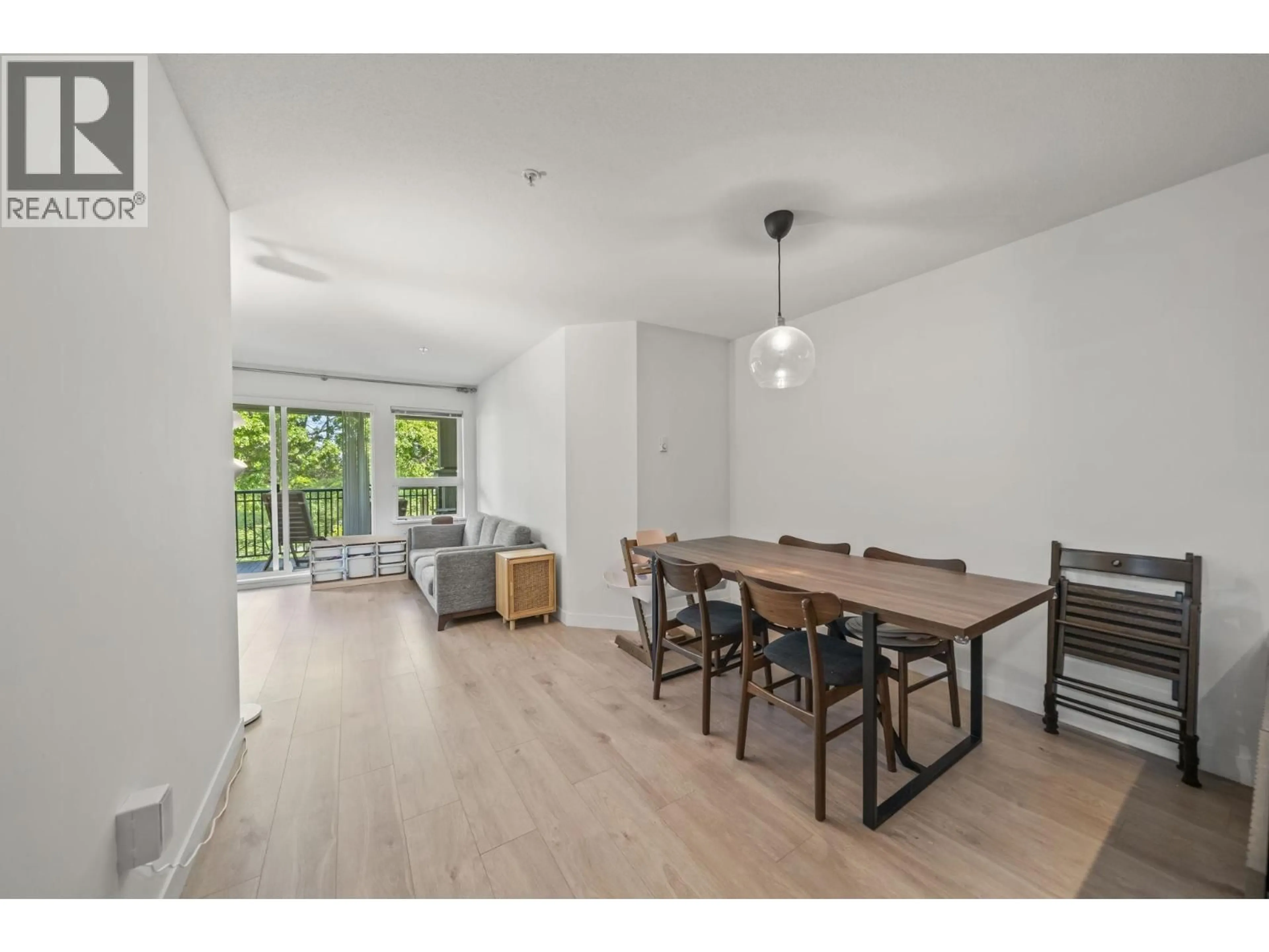 Dining room, wood/laminate floor for 208 - 6800 ECKERSLEY ROAD, Richmond British Columbia V6Y0E7