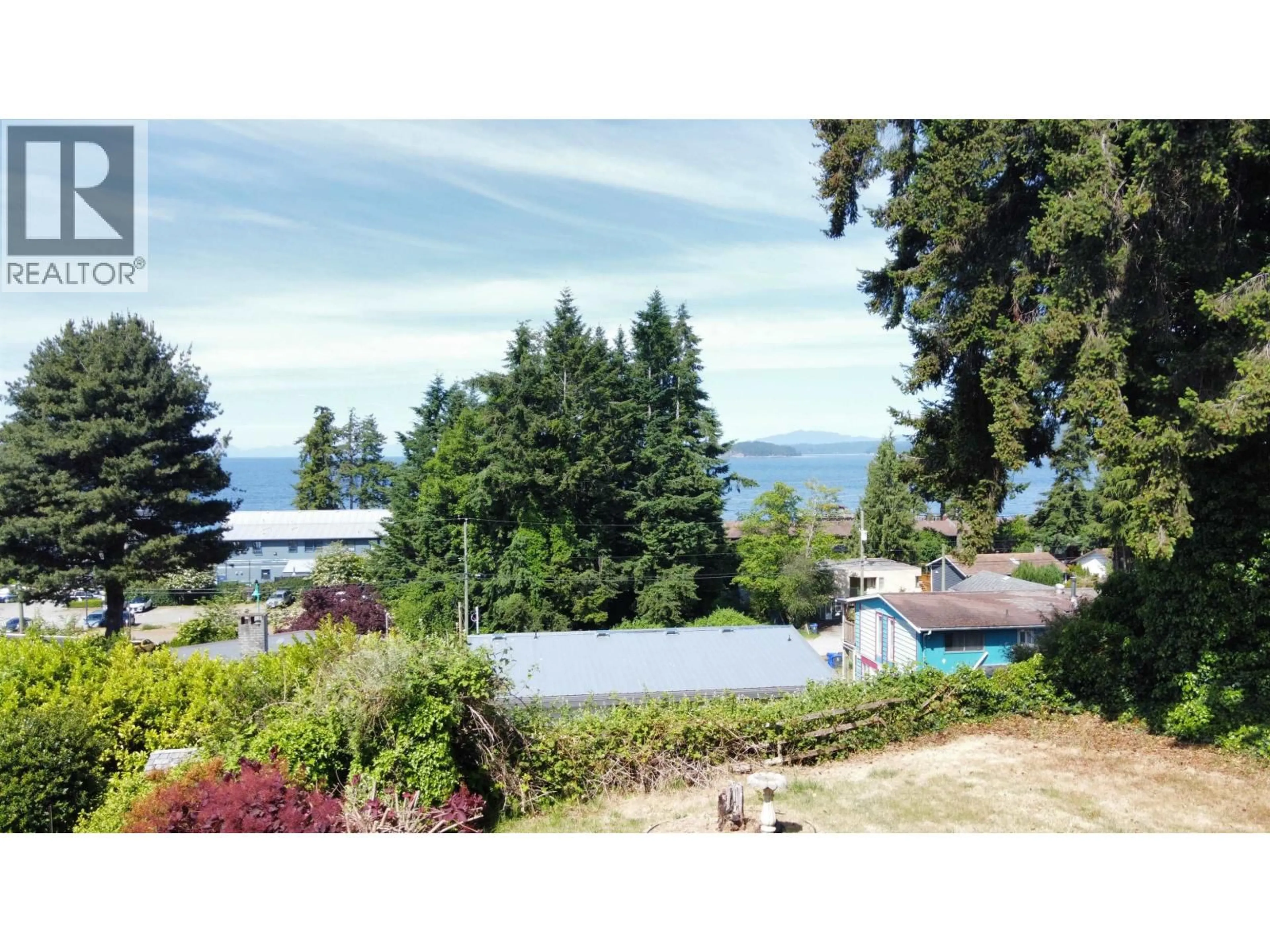 A pic from outside/outdoor area/front of a property/back of a property/a pic from drone, water/lake/river/ocean view for 4731 LAUREL AVENUE, Sechelt British Columbia V7Z0B4