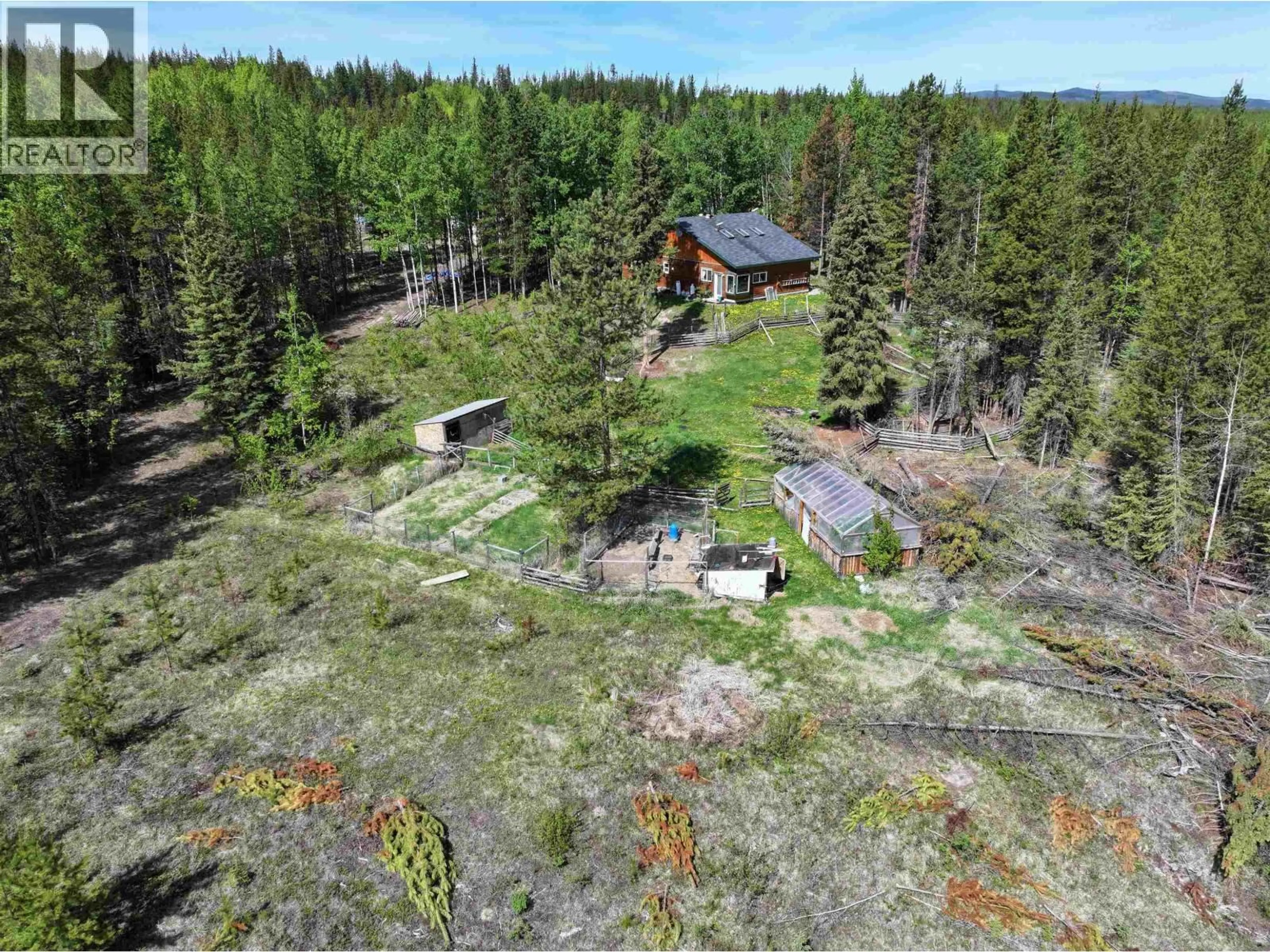 A pic from outside/outdoor area/front of a property/back of a property/a pic from drone, forest/trees view for 1791 COOPER ROAD, Quesnel British Columbia V2J3H9
