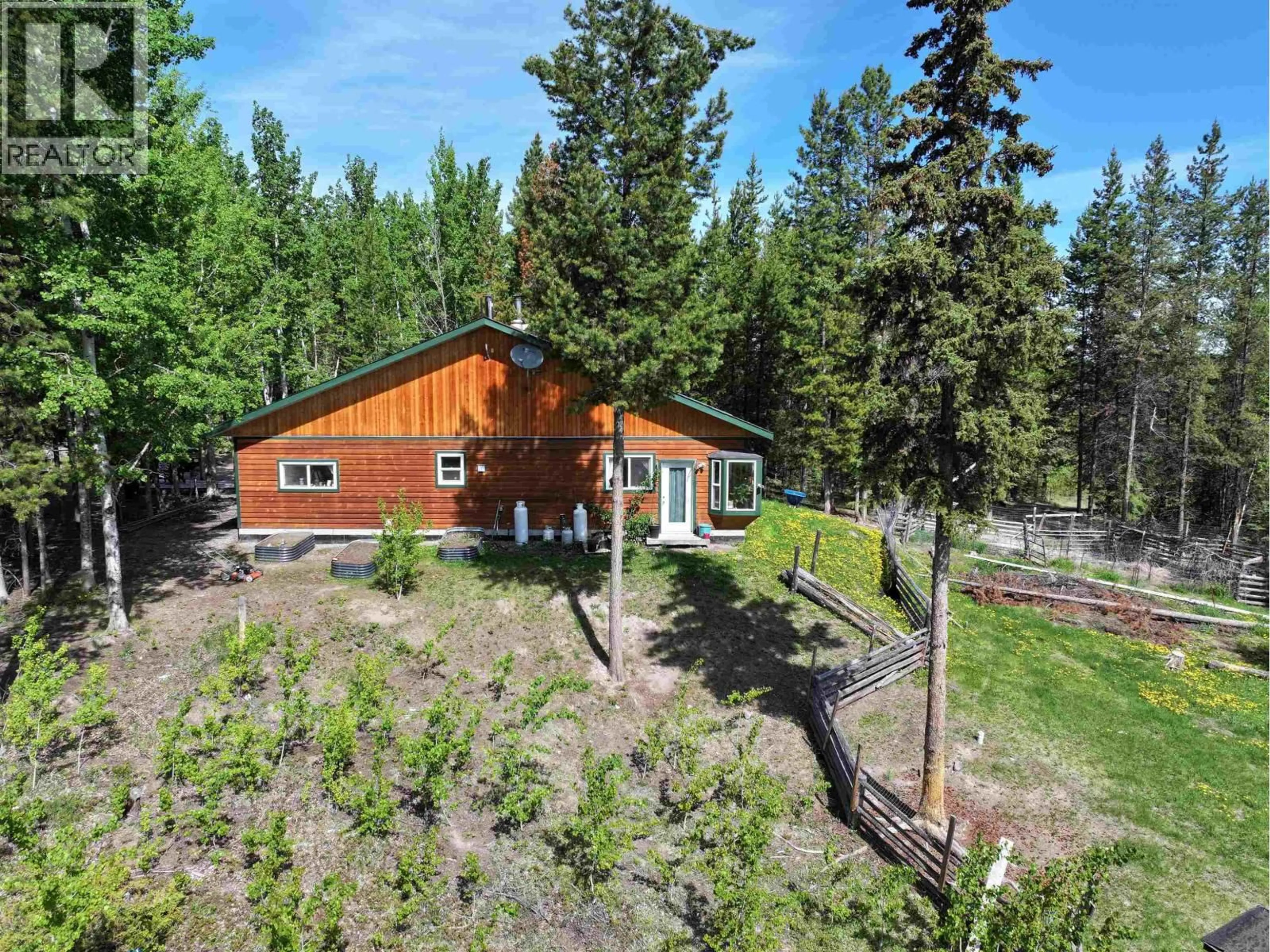 A pic from outside/outdoor area/front of a property/back of a property/a pic from drone, forest/trees view for 1791 COOPER ROAD, Quesnel British Columbia V2J3H9