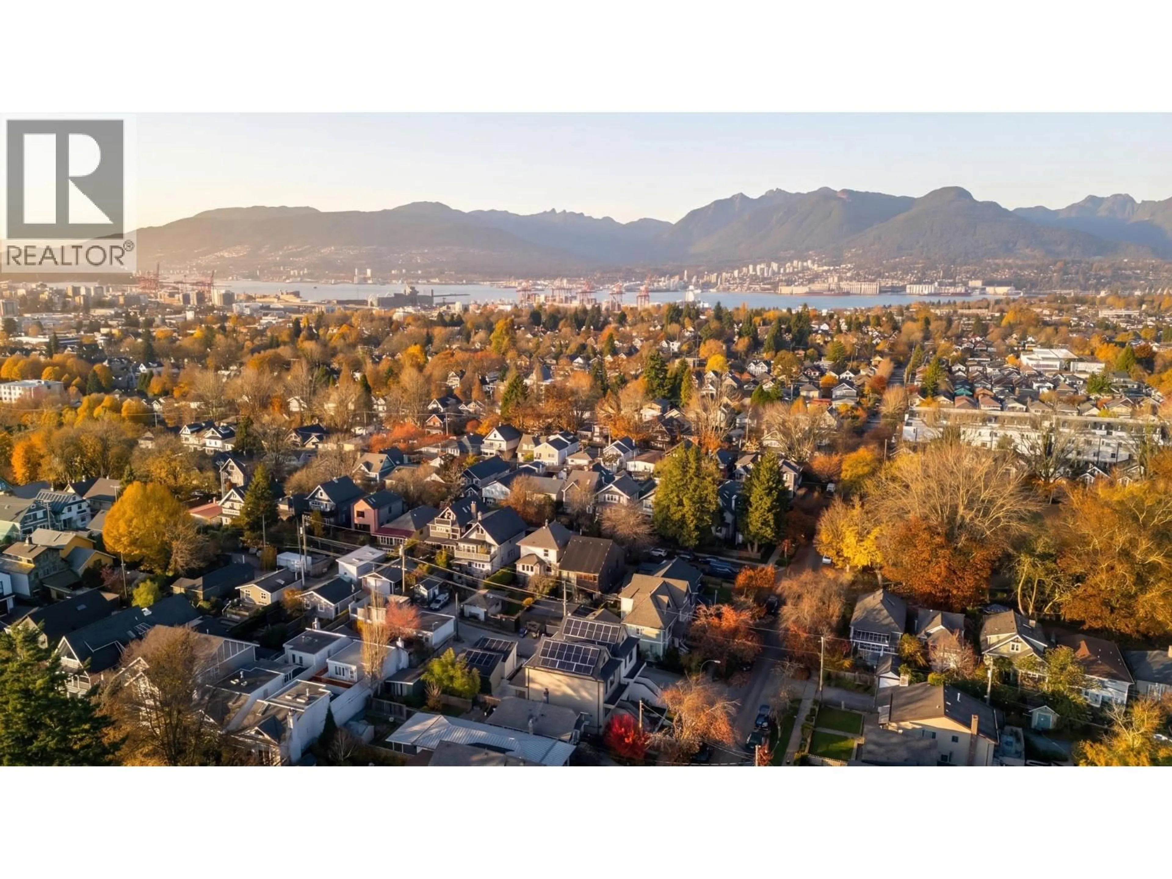 A pic from outside/outdoor area/front of a property/back of a property/a pic from drone, mountain view for 1937 TEMPLETON DRIVE, Vancouver British Columbia V5N4V9