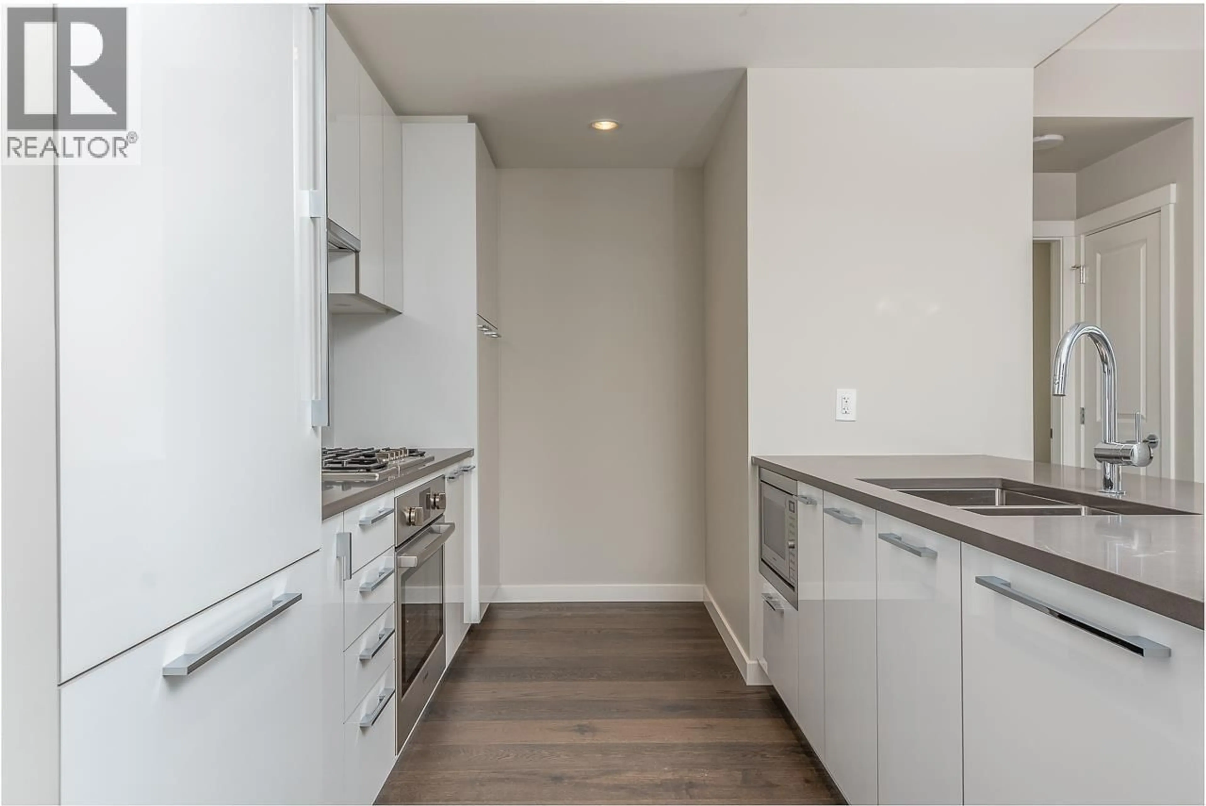 Standard kitchen, wood/laminate floor for 104 - 5687 GRAY AVENUE, Vancouver British Columbia V6S0K7