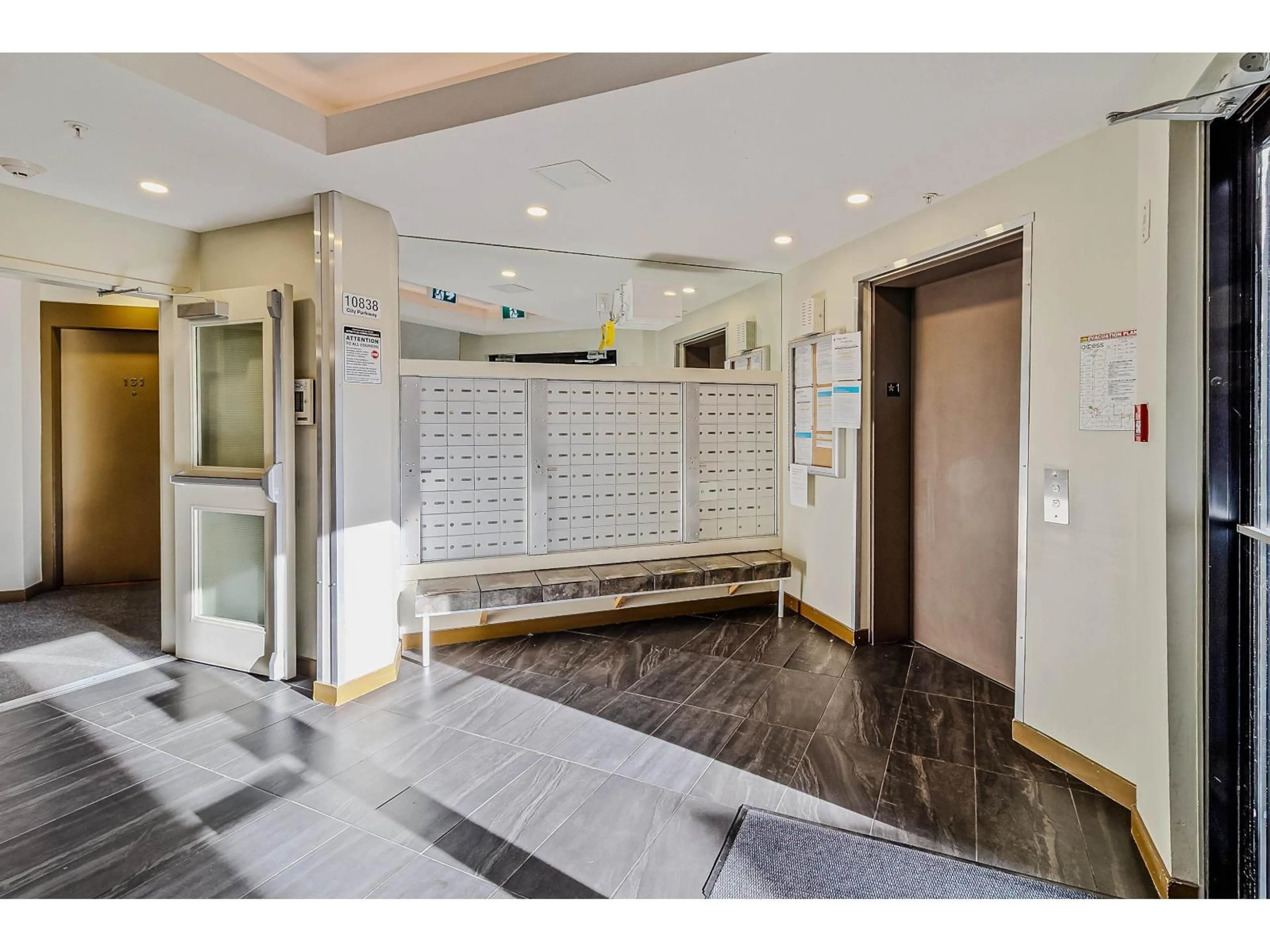 Indoor foyer for 331 - 10838 CITY PARKWAY, Surrey British Columbia V3T5X9