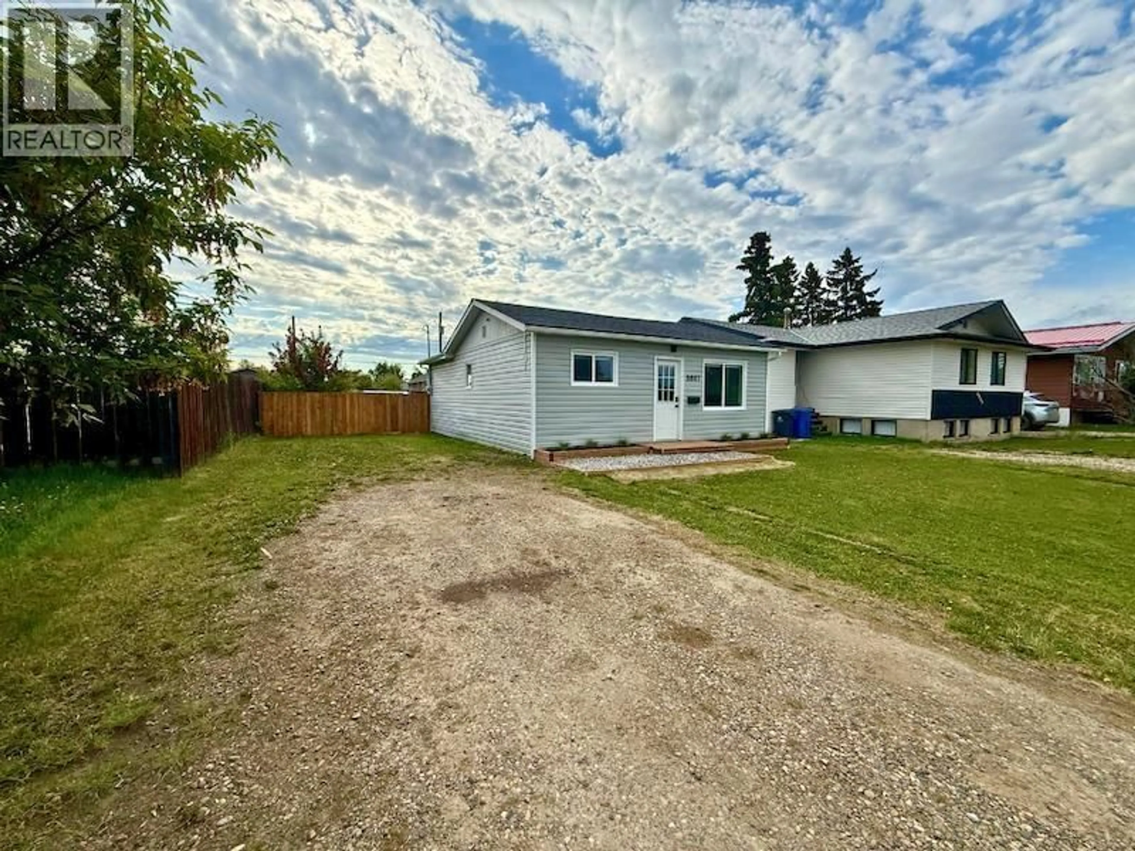 A pic from outside/outdoor area/front of a property/back of a property/a pic from drone, street for 8807 78A STREET, Fort St. John British Columbia V1J3B3