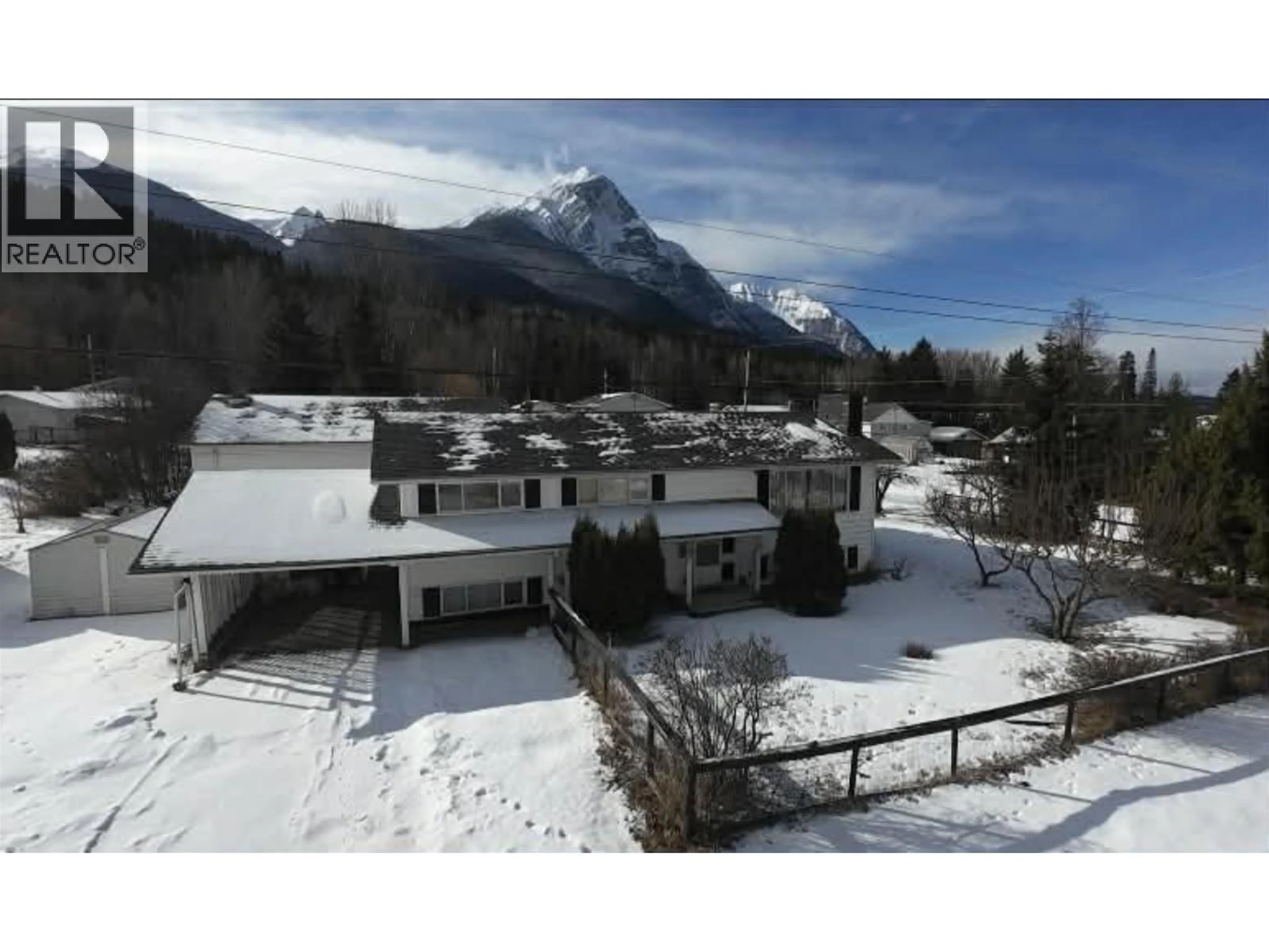 A pic from outside/outdoor area/front of a property/back of a property/a pic from drone, mountain view for 4522 13TH AVENUE, New Hazelton British Columbia V0J2J0