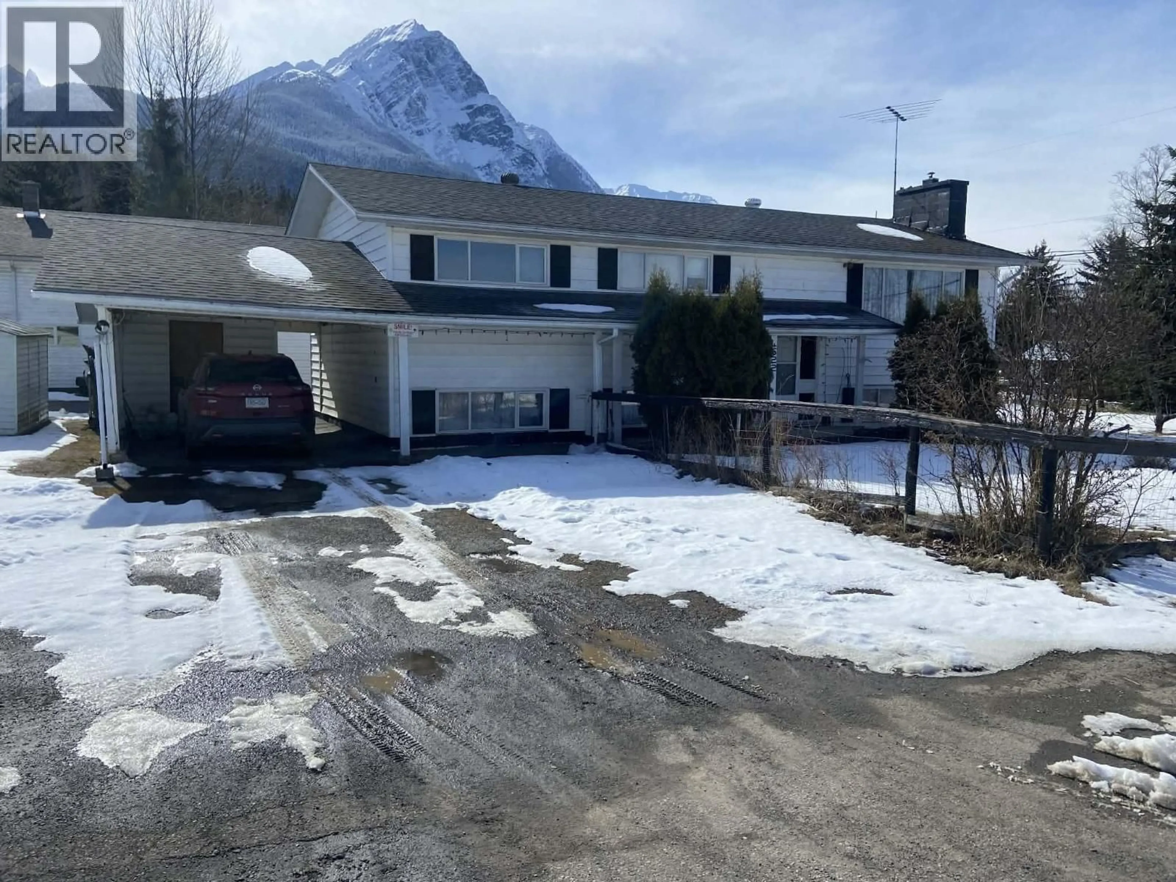 A pic from outside/outdoor area/front of a property/back of a property/a pic from drone, mountain view for 4522 13TH AVENUE, New Hazelton British Columbia V0J2J0