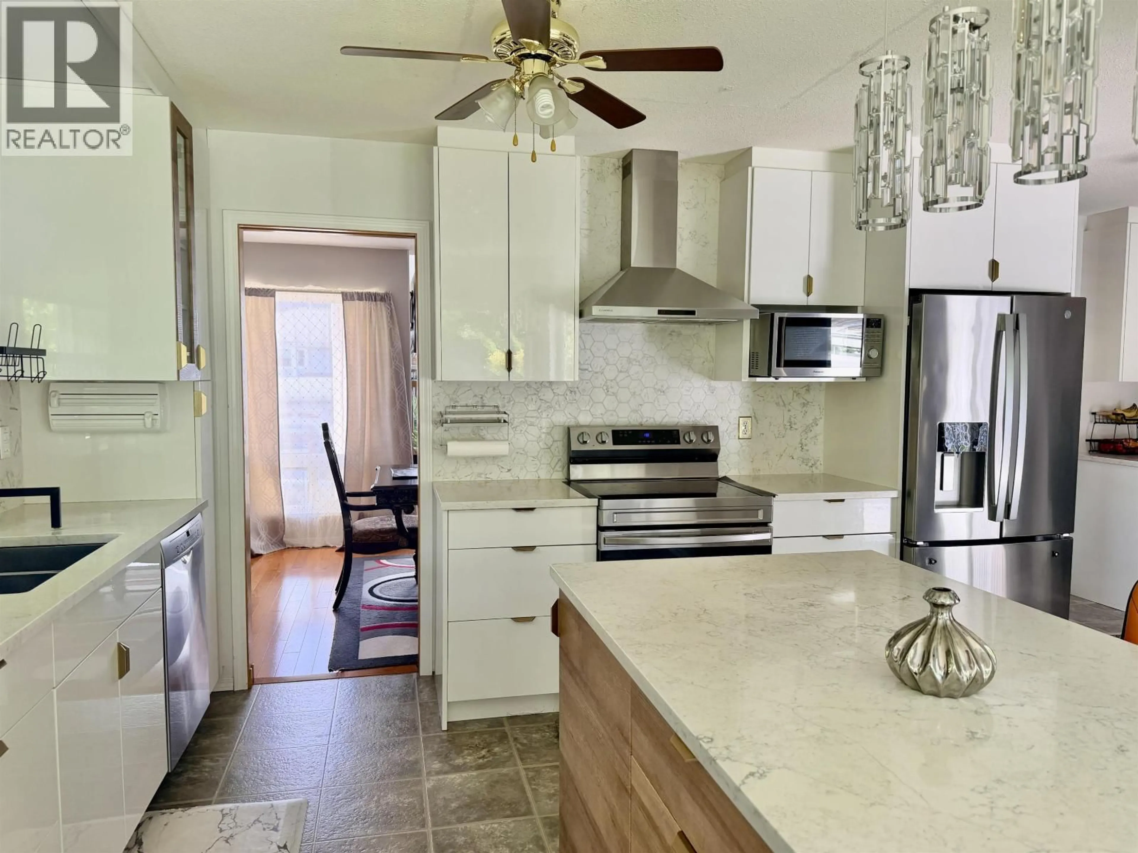 Open concept kitchen, ceramic/tile floor for 44 STICKNEY STREET, Kitimat British Columbia V8C2R3