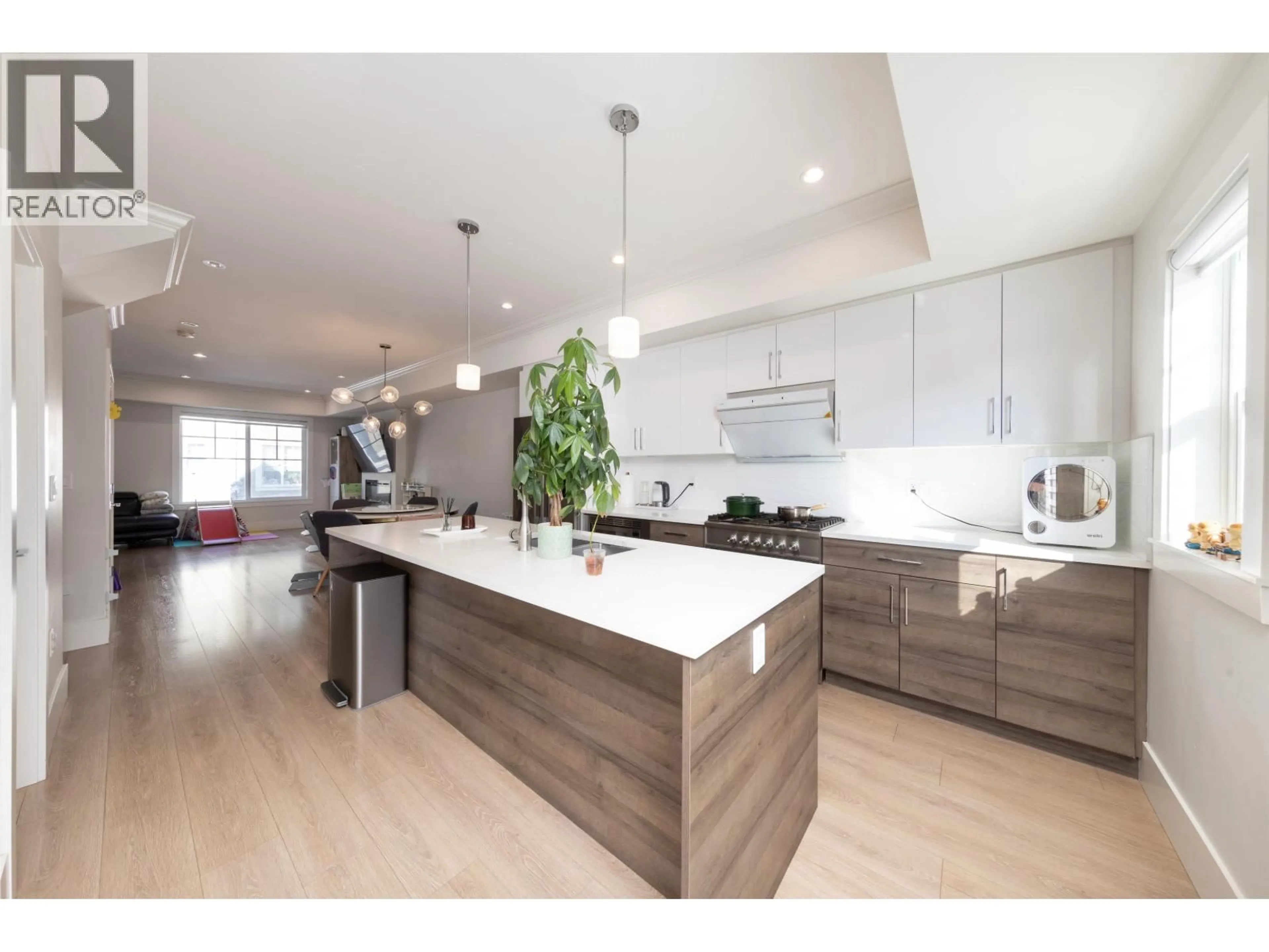 Open concept kitchen, wood/laminate floor for 9 - 9211 MCKIM WAY, Richmond British Columbia V6X0T1