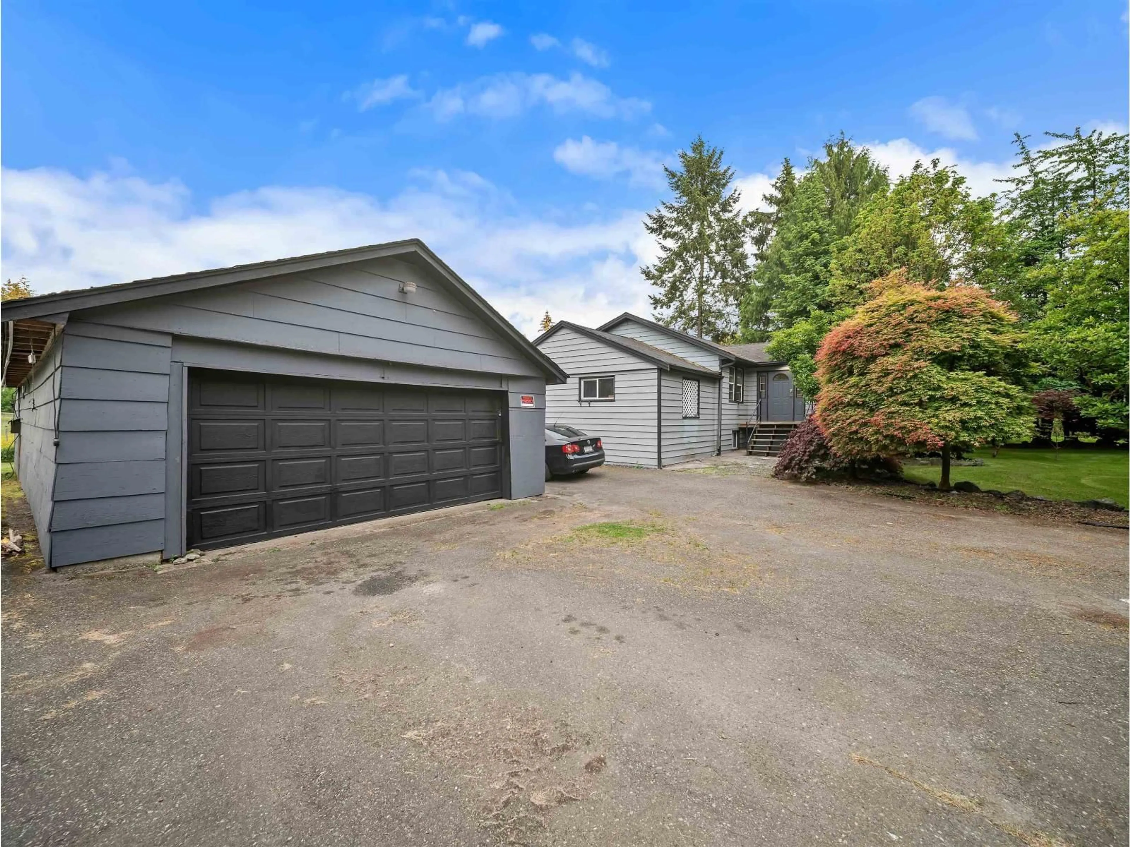 A pic from outside/outdoor area/front of a property/back of a property/a pic from drone, street for 1642 232 STREET, Langley British Columbia V2Z1K7