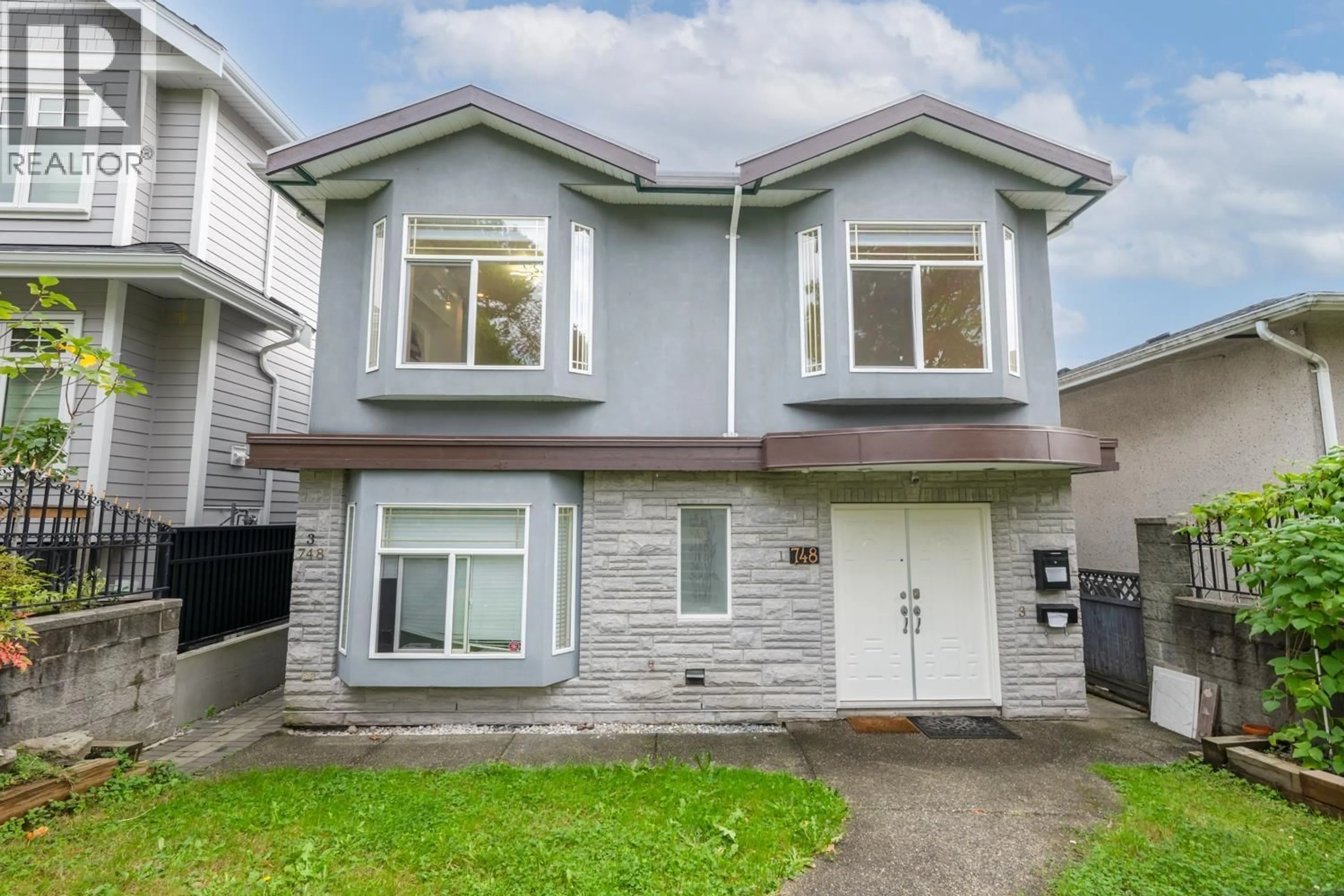 Home with vinyl exterior material, street for 748 62ND AVENUE, Vancouver British Columbia V5X2G5