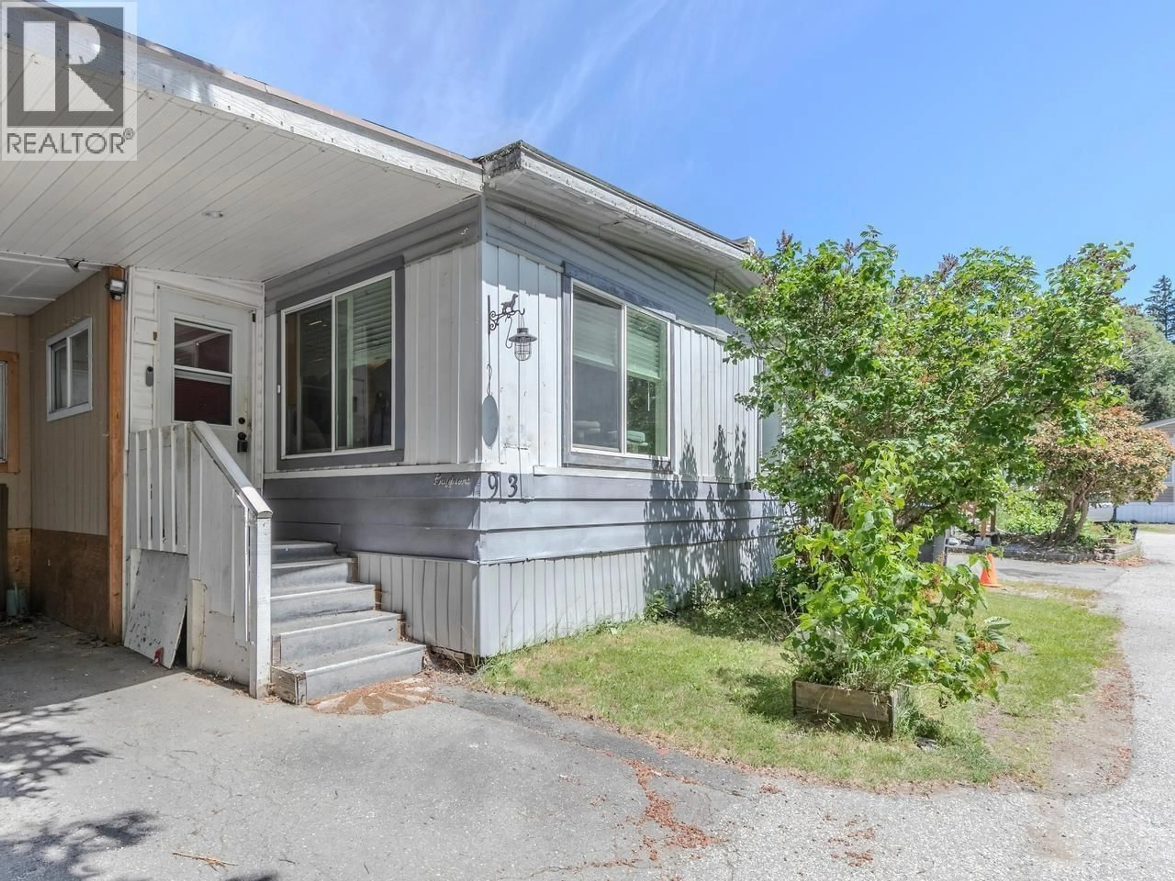 Home with vinyl exterior material, street for 93 - 40157 GOVERNMENT ROAD, Squamish British Columbia V0N1T0