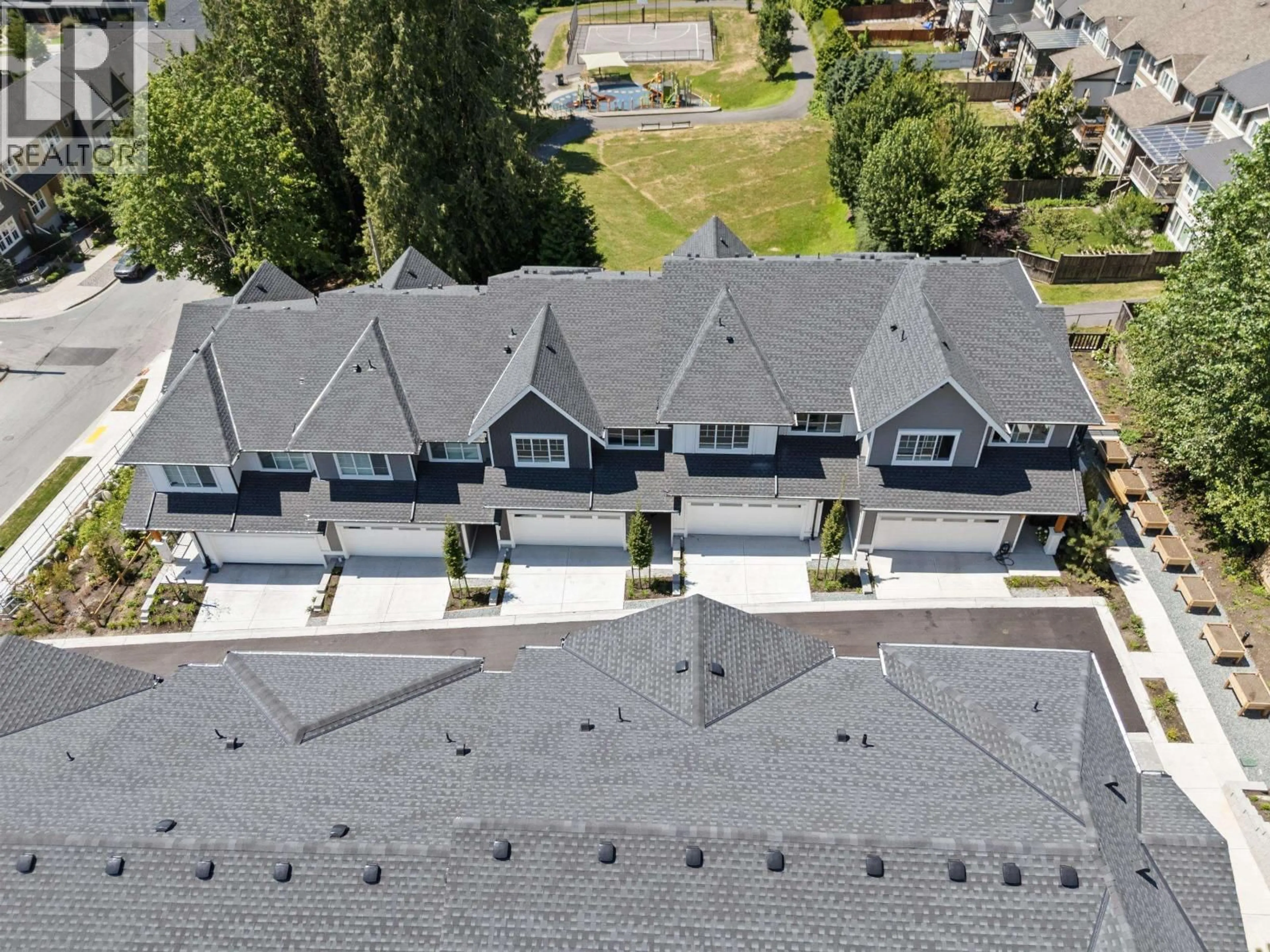 A pic from outside/outdoor area/front of a property/back of a property/a pic from drone, street for 103 - 3421 QUEENSTON AVENUE, Coquitlam British Columbia V3E0V9