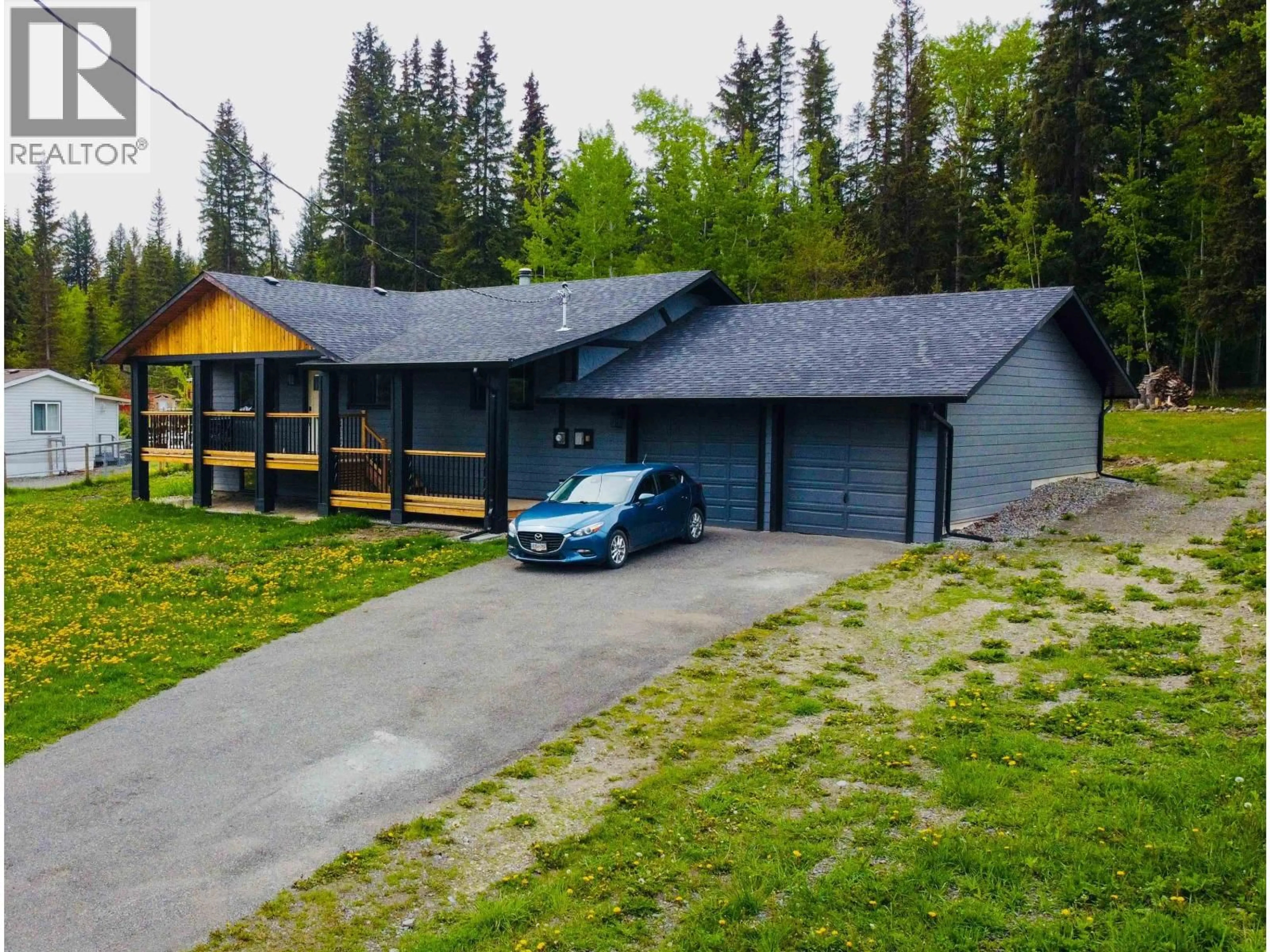 A pic from outside/outdoor area/front of a property/back of a property/a pic from drone, street for 6062 NORMAN ROAD, Horse Lake British Columbia V0K2E3