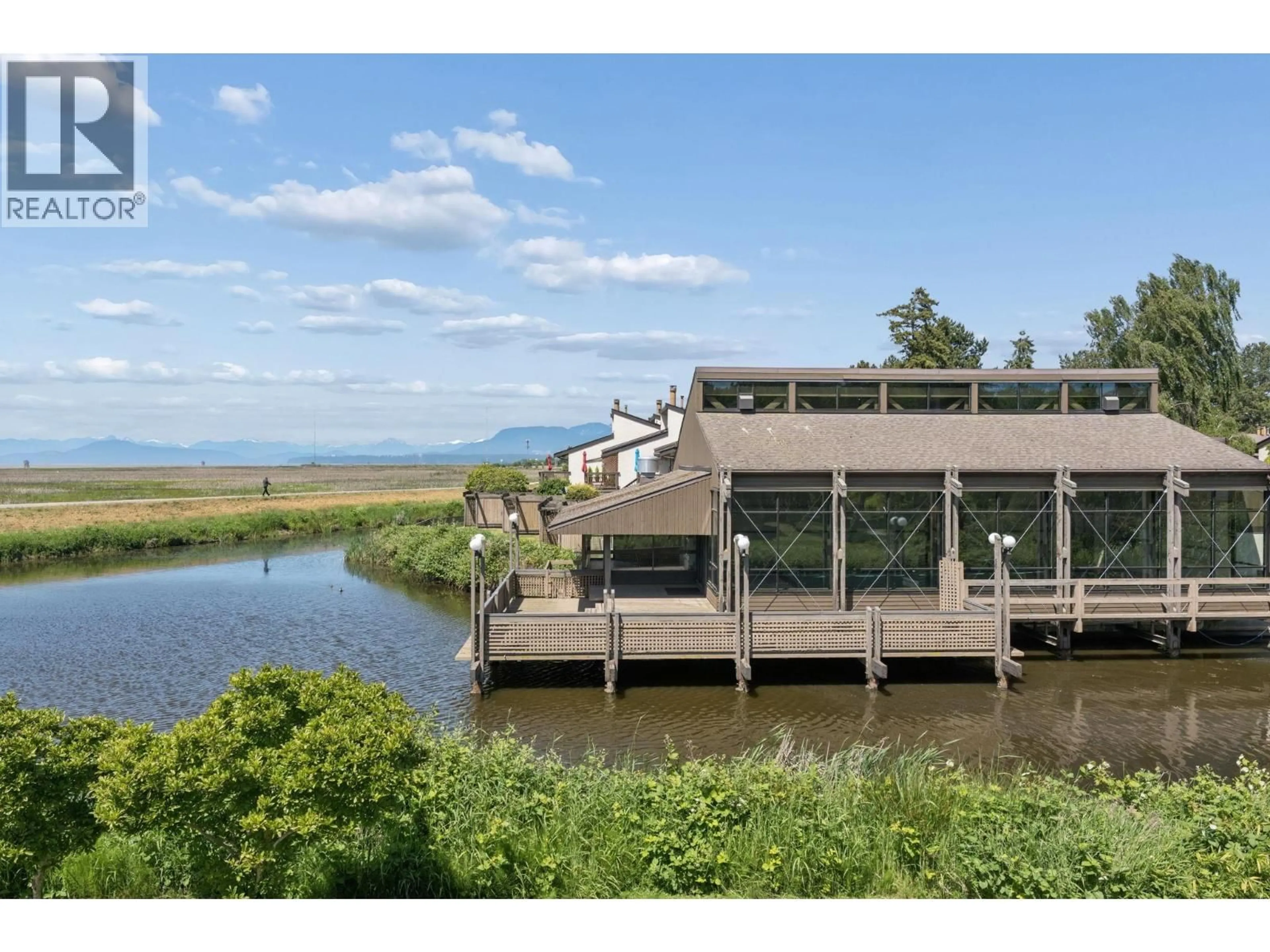 A pic from outside/outdoor area/front of a property/back of a property/a pic from drone, water/lake/river/ocean view for 86 - 11491 7TH AVENUE, Richmond British Columbia V7E4J5